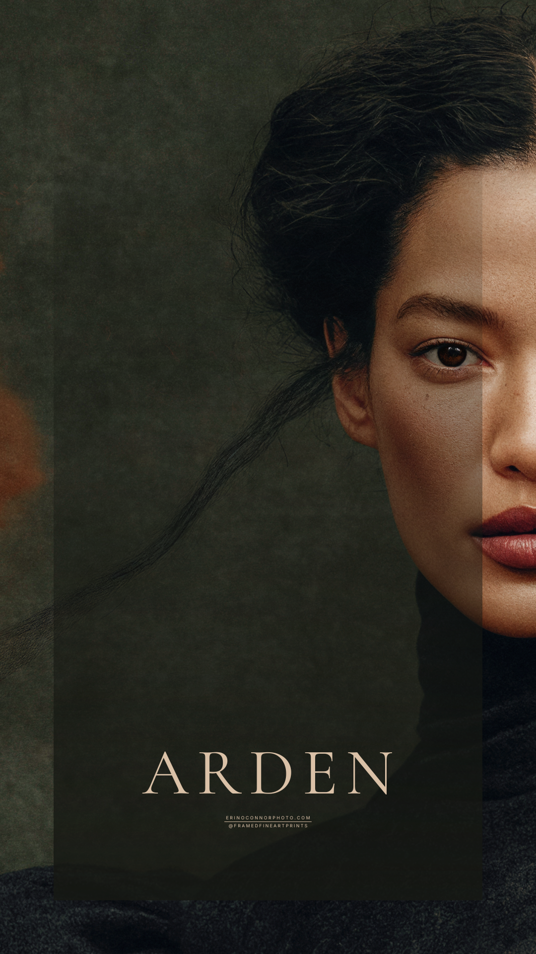 Close portrait of Arden with dark hair, a direct gaze and a high necked black sculptural garment.