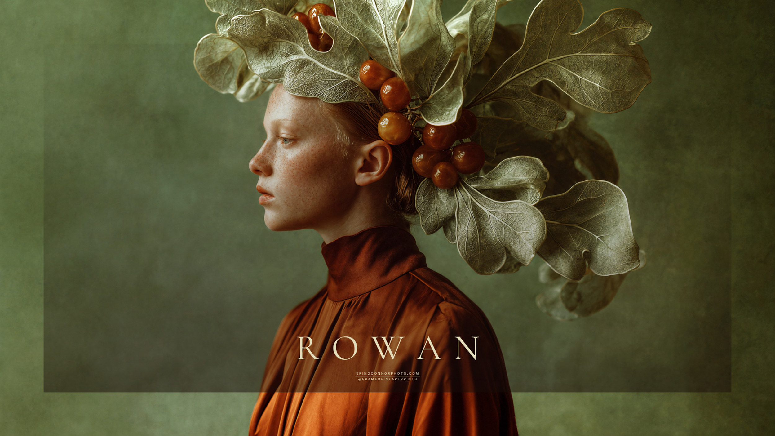 Rowan shown in profile beneath a sculptural headdress of pale fig leaves and fruit against a muted green background.