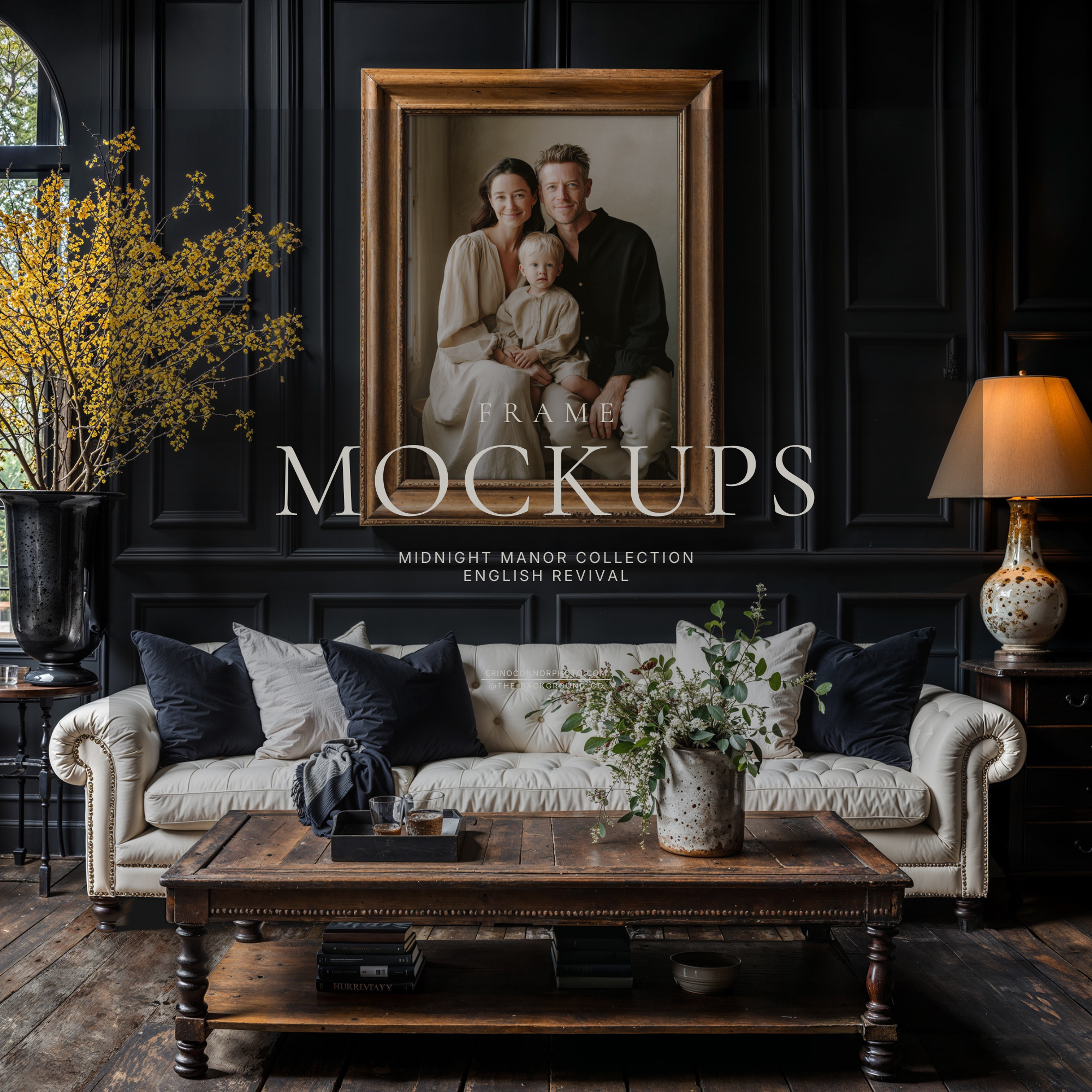 Dark English manor wall art mockup with portrait display, cream sofa, vintage wood frame, and paneled walls for photographers selling framed artwork.