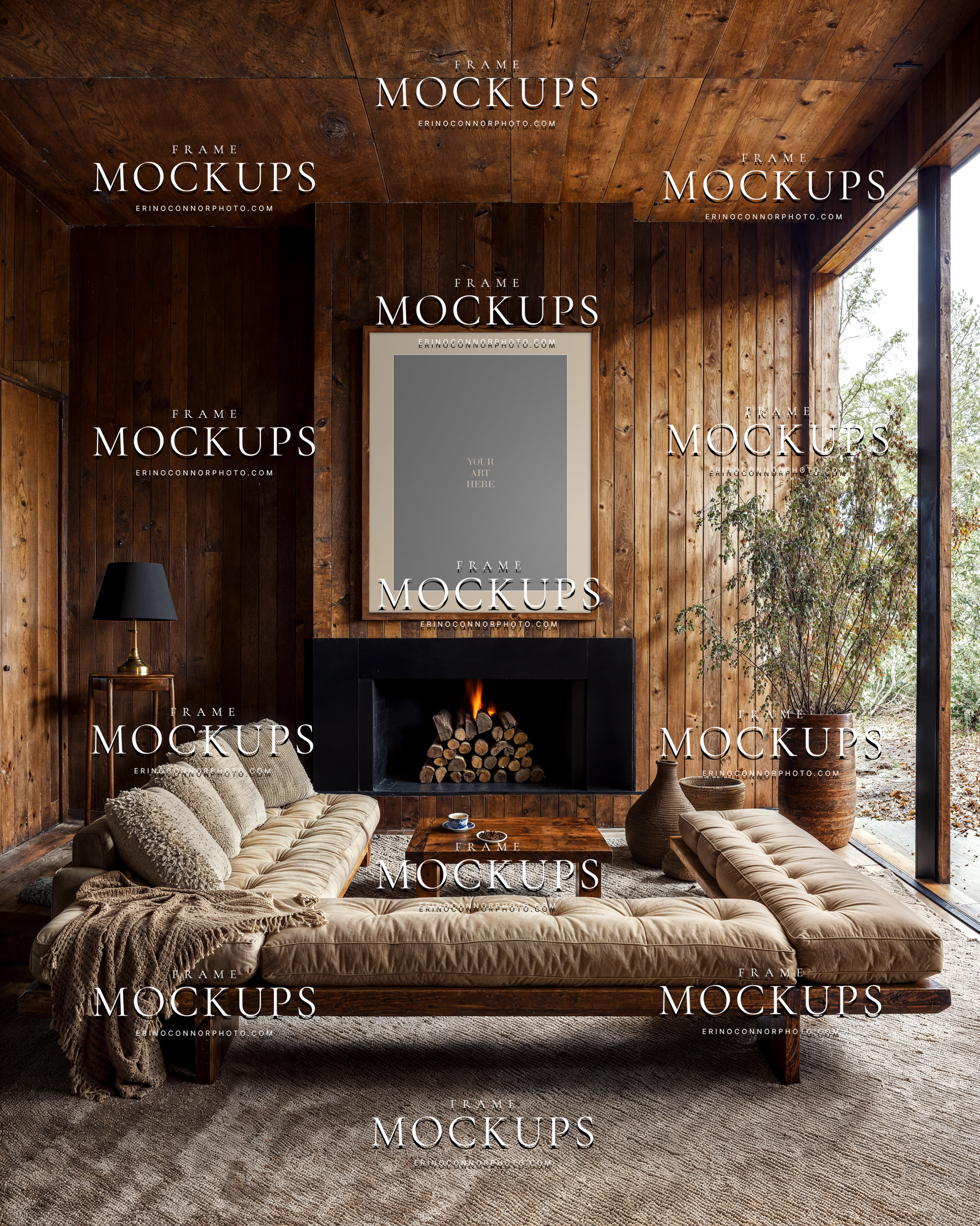 Rustic modern vertical frame mockup above a dark fireplace with low cream seating, wood paneled walls, and soft natural light in a boho cabin interior