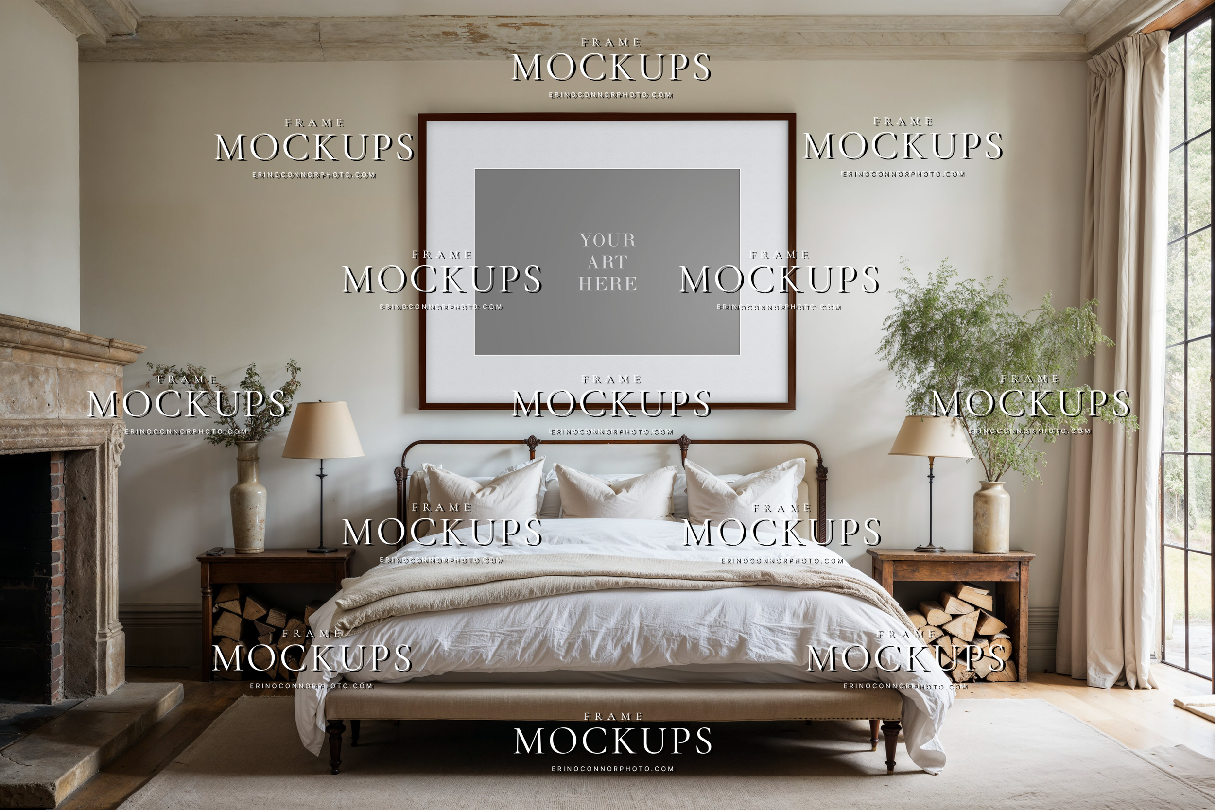 Clean organic modern bedroom frame mockup with a tall light wood frame above an antique fireplace, white bedding, rustic bench, and warm neutral interior styling.