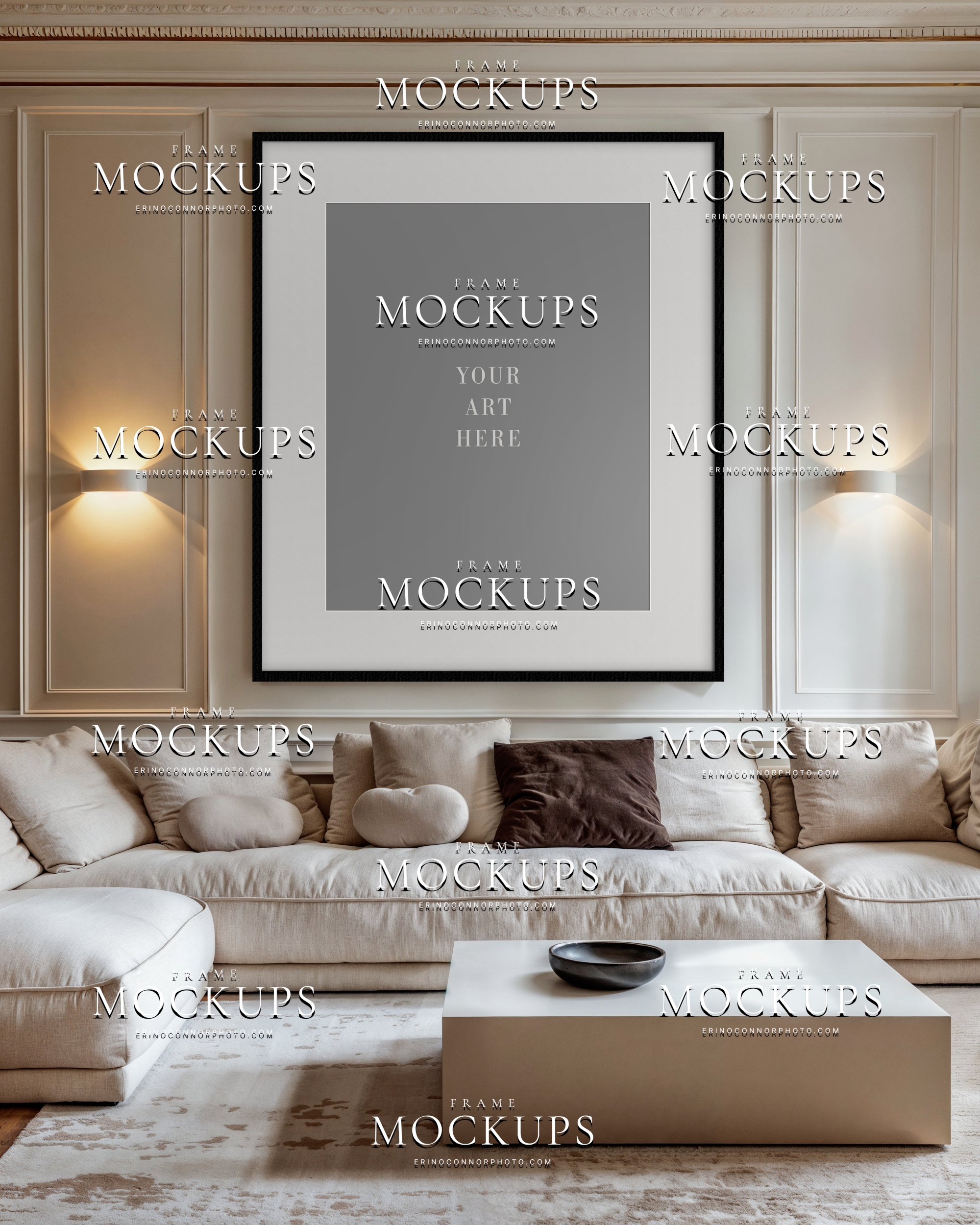 Contemporary wall art mockup with taupe panel walls, warm sconces, and large black framed portrait display above a neutral sofa for photographers and artists.