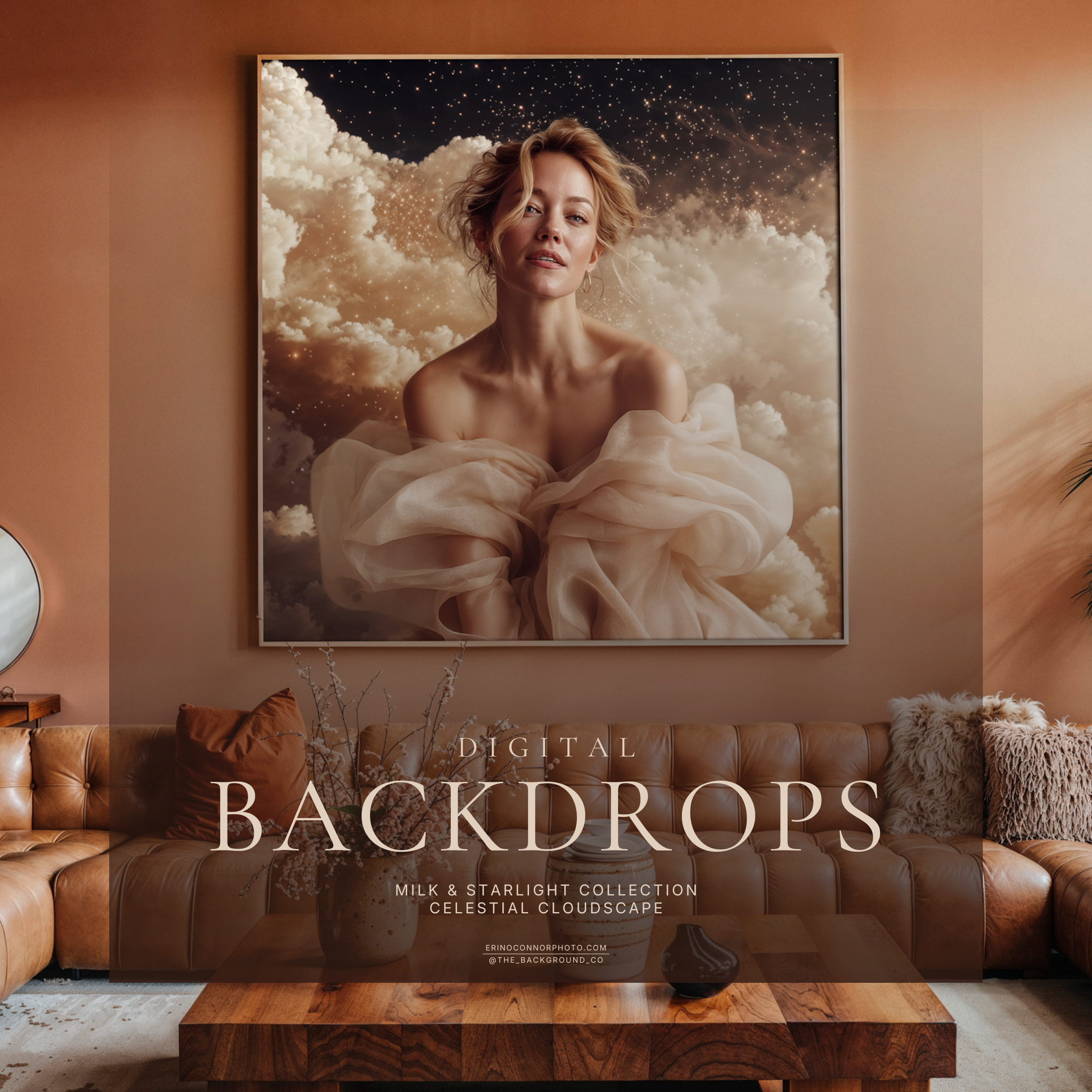 Framed portrait artwork displayed above a tan sofa, showing how the Milk & Starlight celestial cloud background can be presented as wall art.