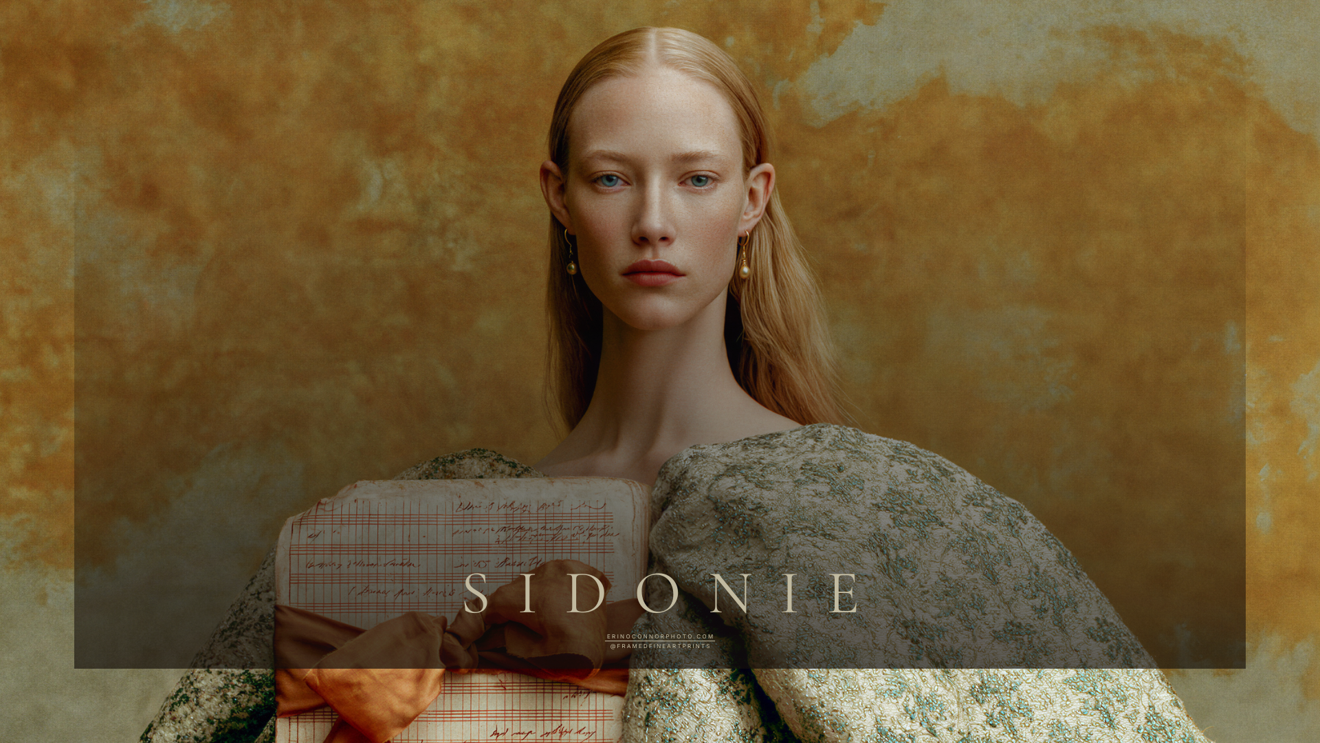 Horizontal portrait of Sidonie holding aged ledger pages tied with copper ribbon while wearing a pale brocade gown.