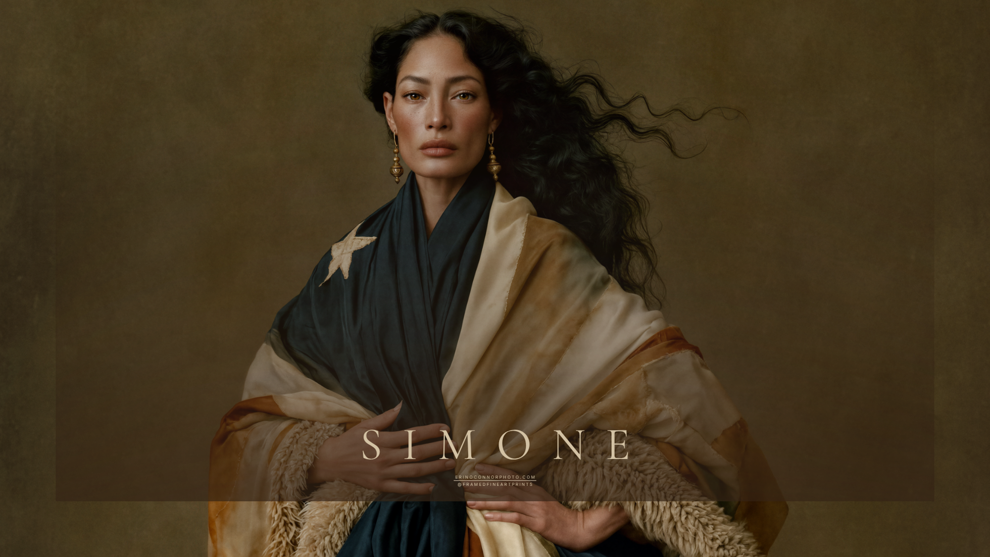 Simone arranging the folds of an aged flag like garment around herself in a painterly fine art portrait.