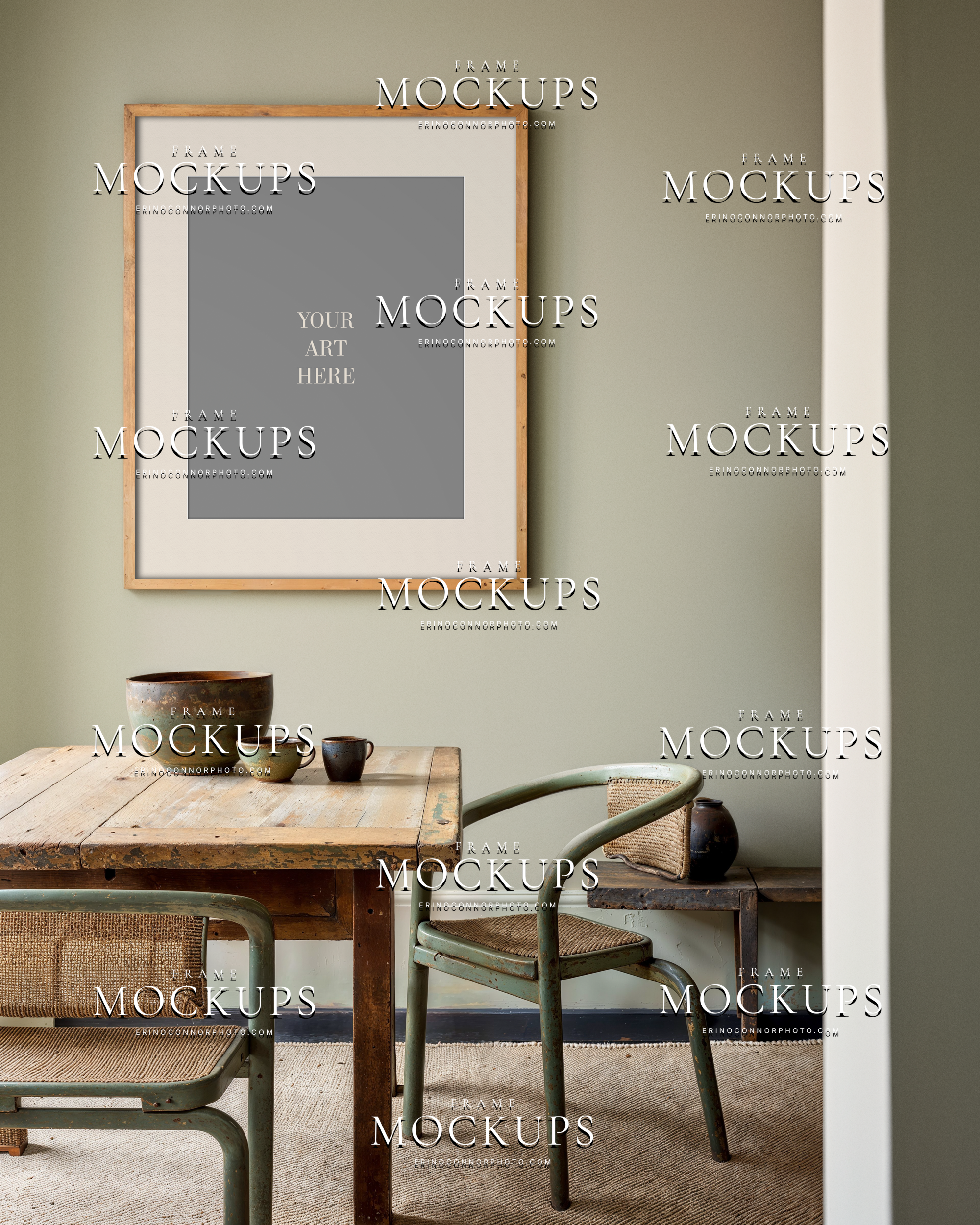 Empty rustic farmhouse wall art mockup with horizontal wood frame above a vintage table, rustic chairs, pottery, and soft sage wall styling