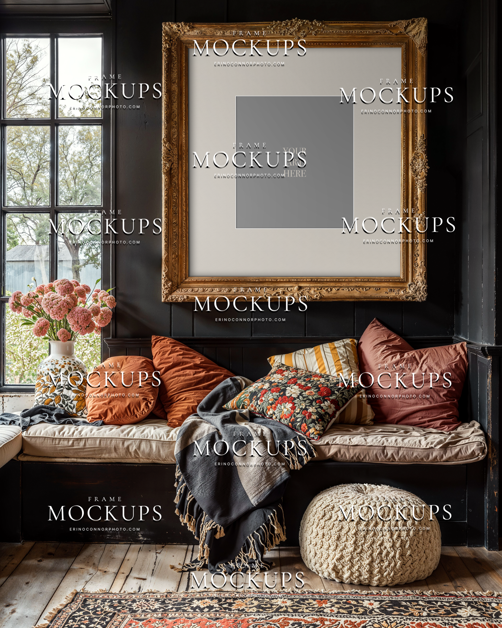 Boho cottagecore frame mockup with a blank ornate gilded vertical frame above a built in window bench, dark paneled walls, floral pillows, and natural window light.
