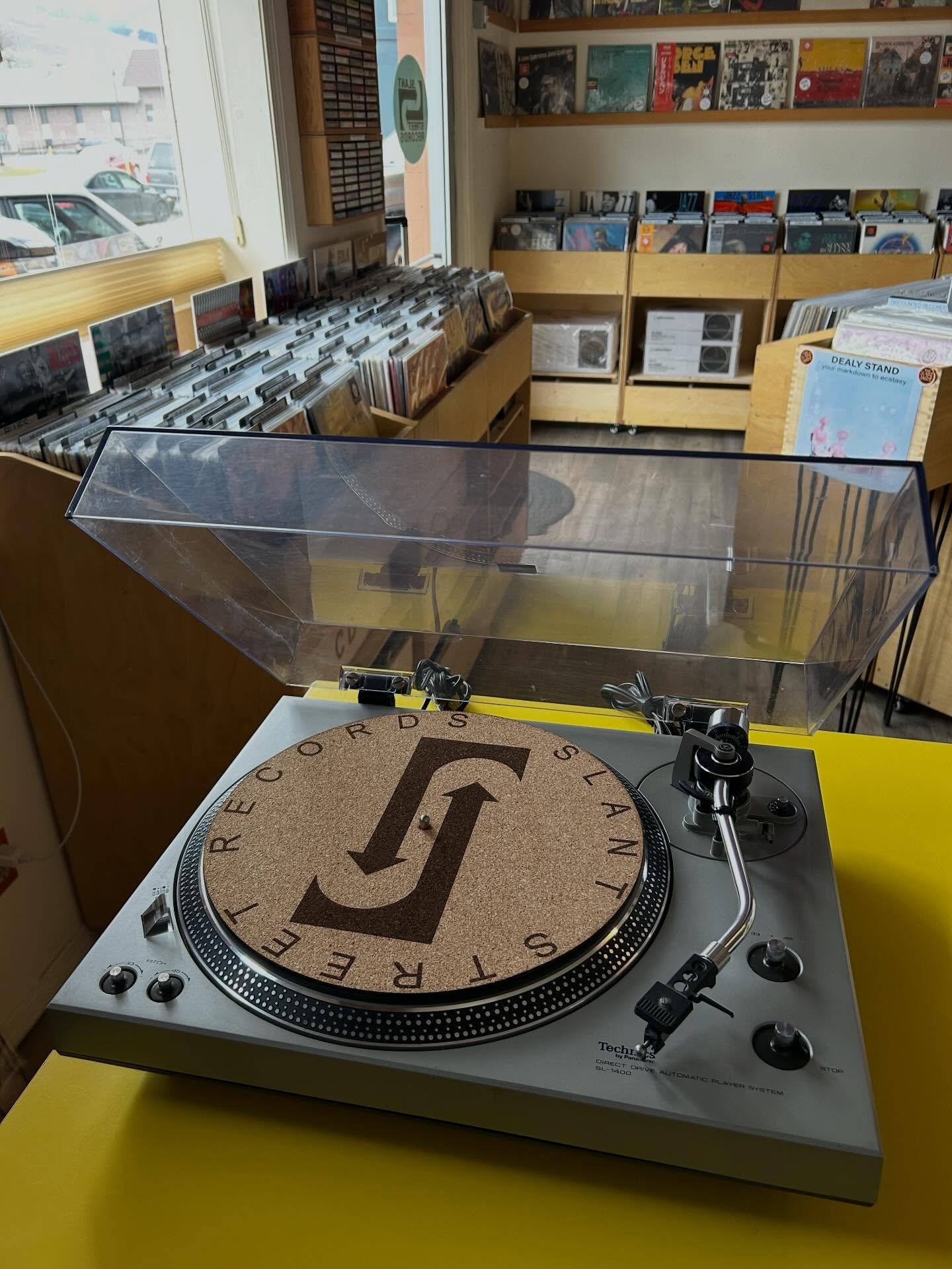 Freshly serviced Technics Direct Drive Semi-Auto SL-1400 turntable going out at Slant. Super beefy mid-70s turntable with a rock solid direct drive motor and an auto-return tonearm with a freshly tipped Stanton 681EEE cartridge. This beauty is ready 