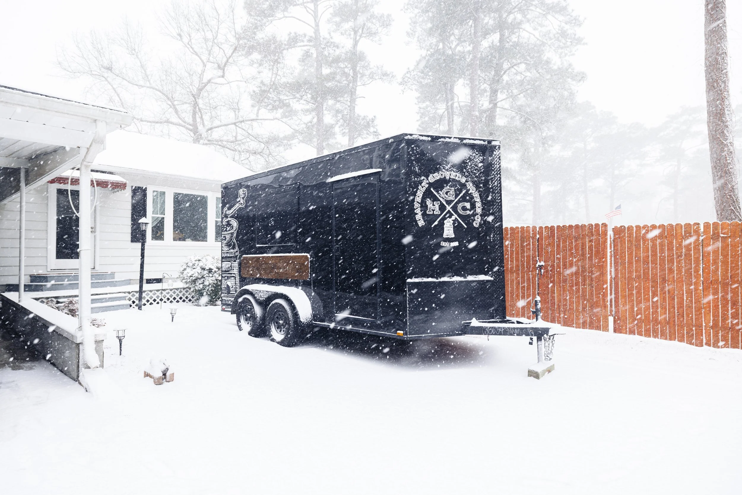 Black HGCC Trailer in a snowstorm