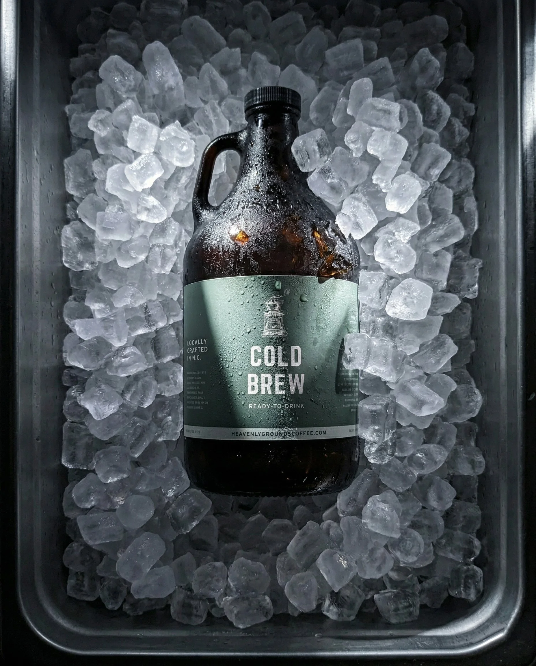 A Heavenly Grounds Cold Brew Growler on ice