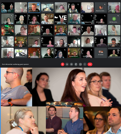 Screenshot of a virtual meeting with numerous participants on a video call. In the bottom section, there are five different people attending an in-person event or conference, engaged in the presentation or discussion.