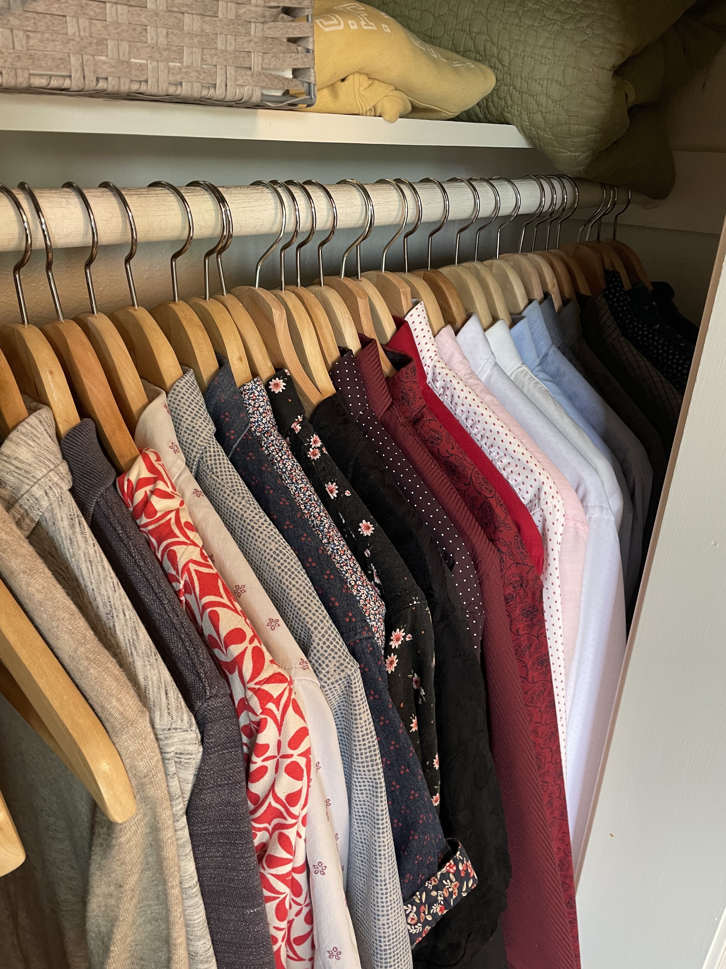 Men's Closet Organized wooden hangers