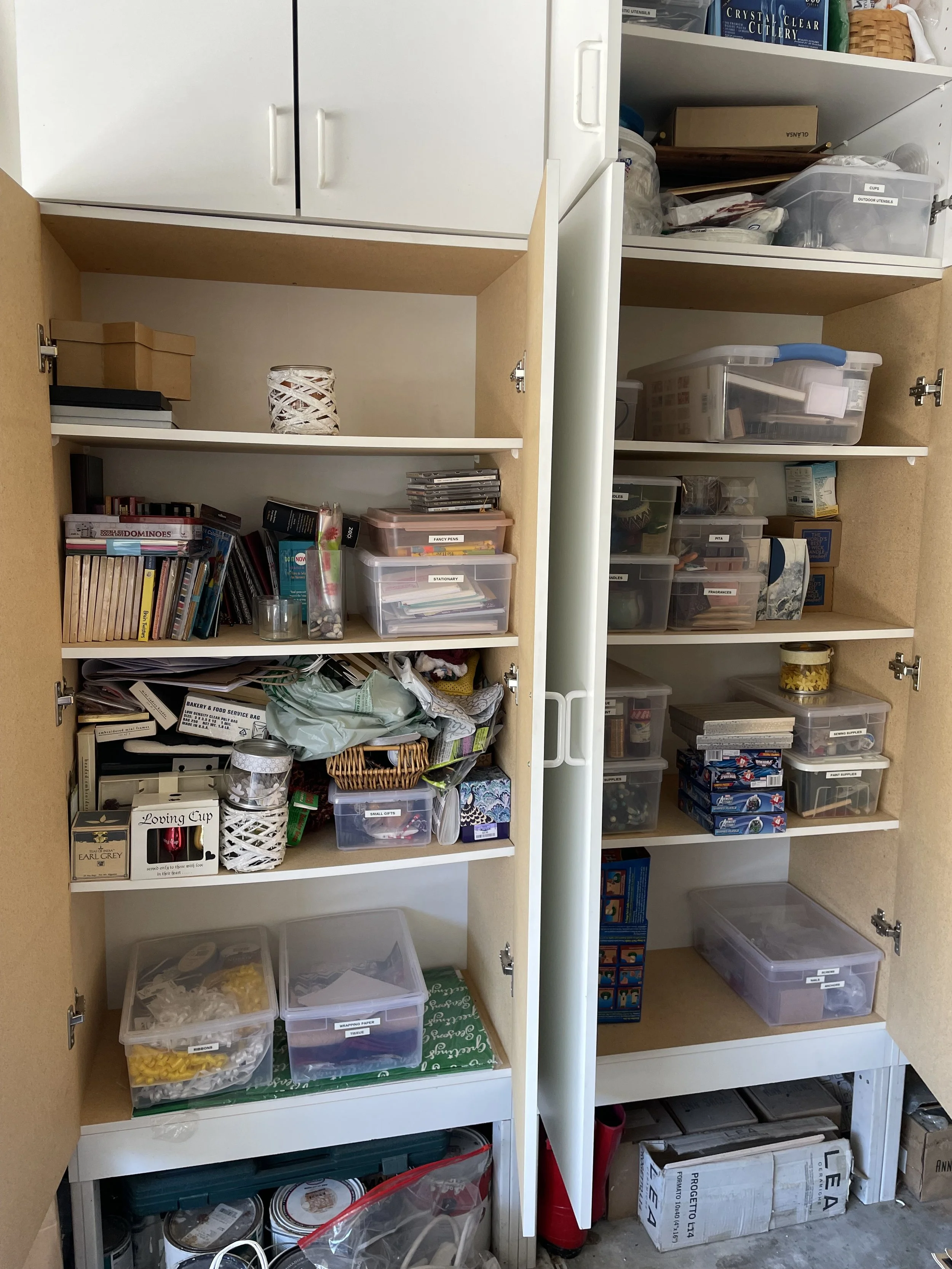 Unorganized home supplies cabient