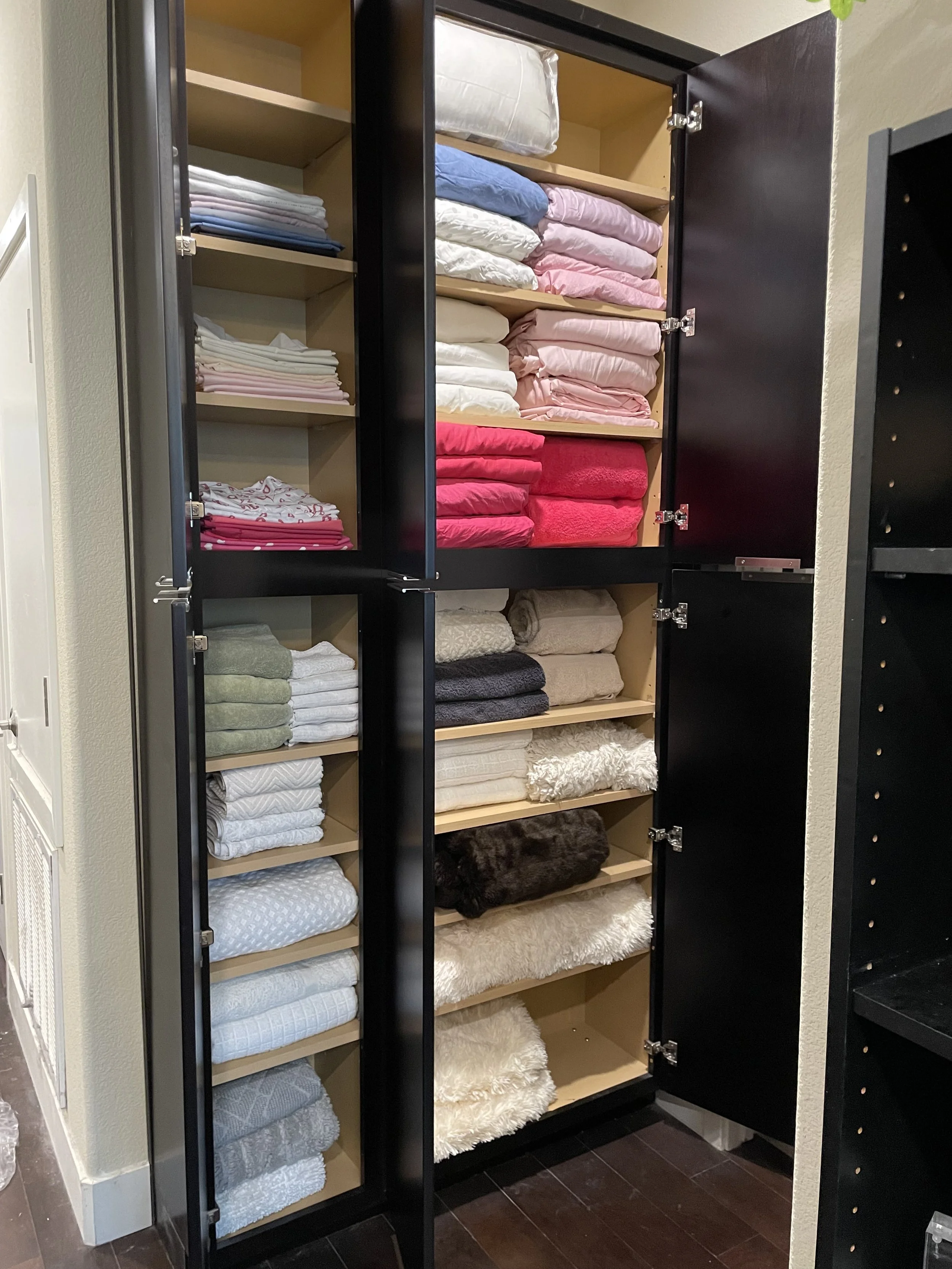 Organized Linen Closet 