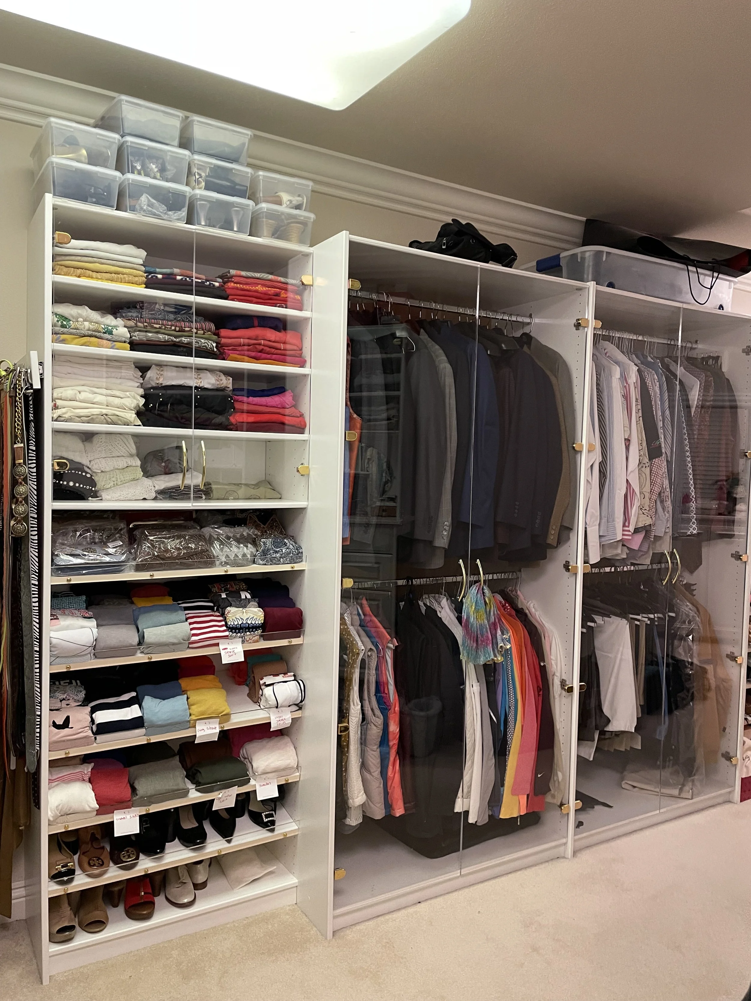 His and Hers Walk-in Closet organized professionally