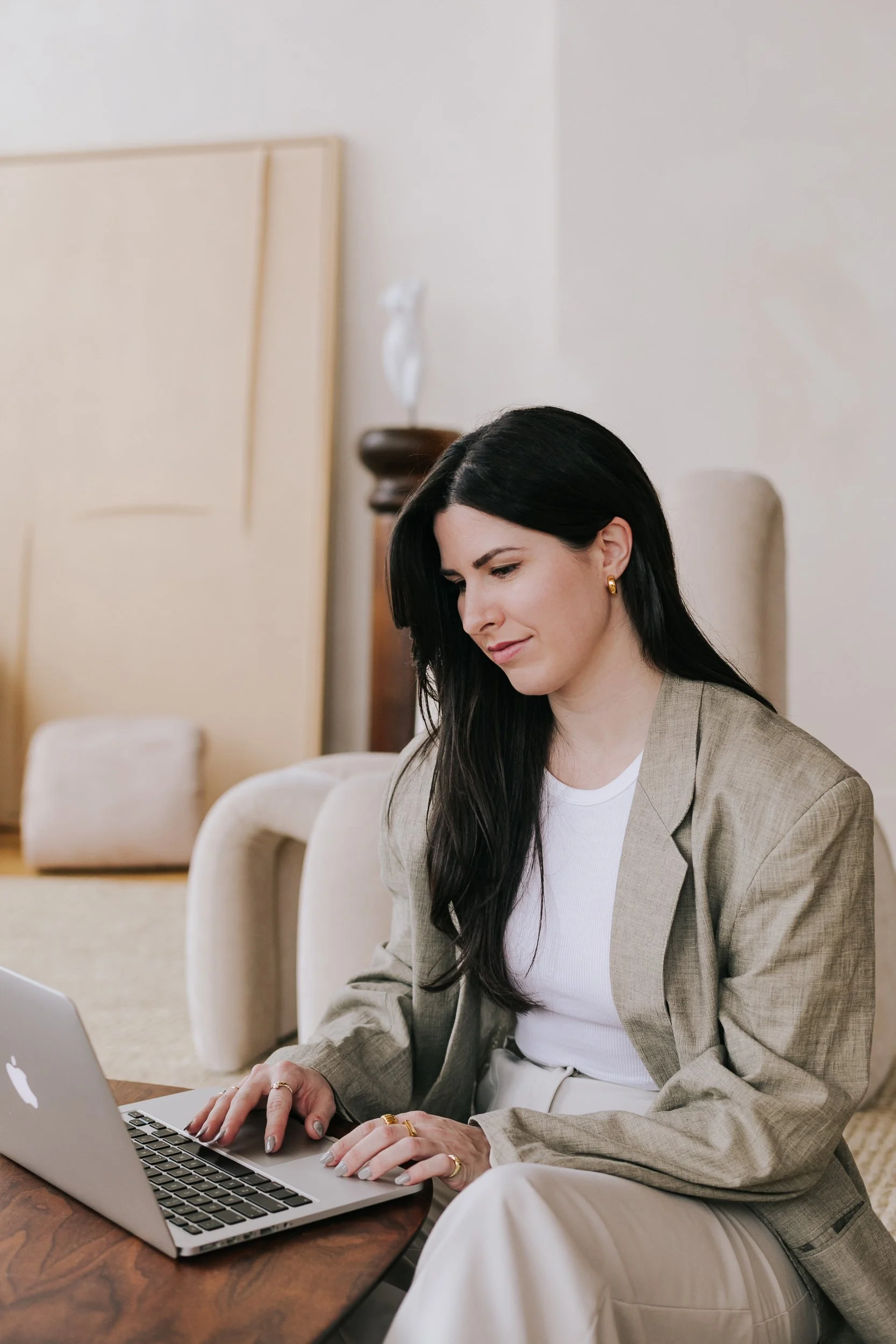 Mackenzie McIntyre, lead brand designer and owner of Oak + Ember Design Studio