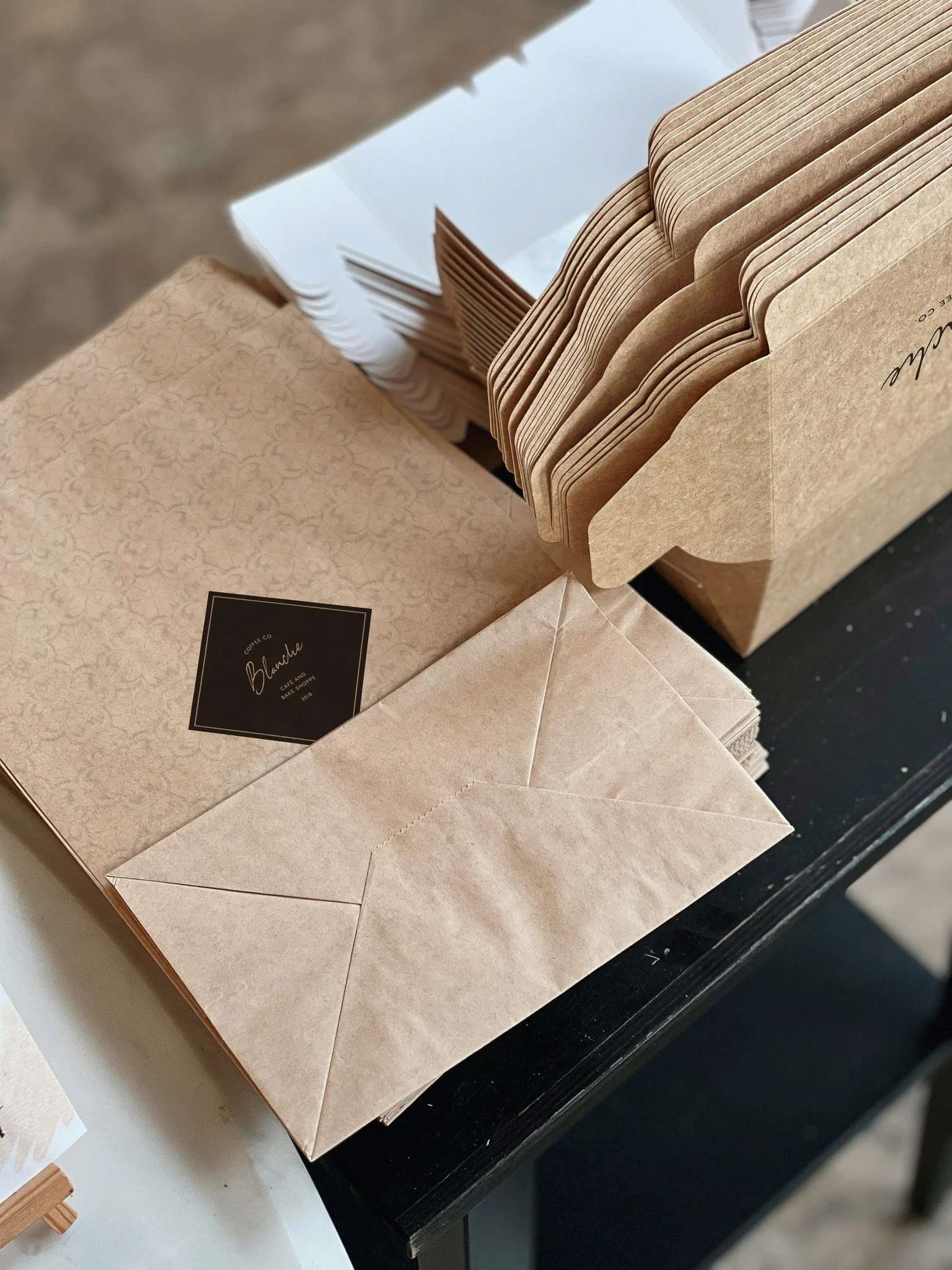 Blanche Coffee Co branded takeaway packaging design