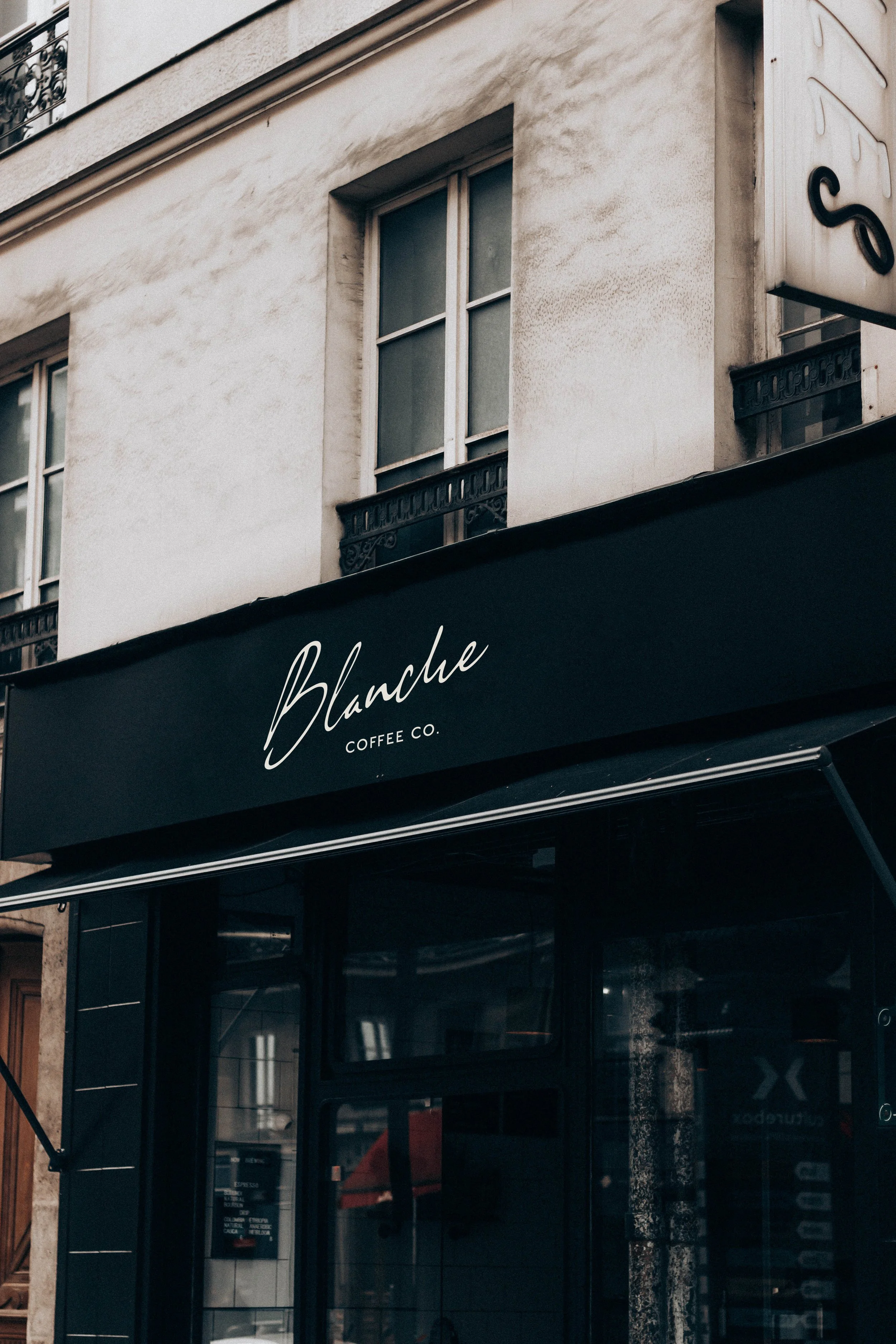 Blanche Coffee Co chic, Parisian inspired coffee shop brand identity storefront