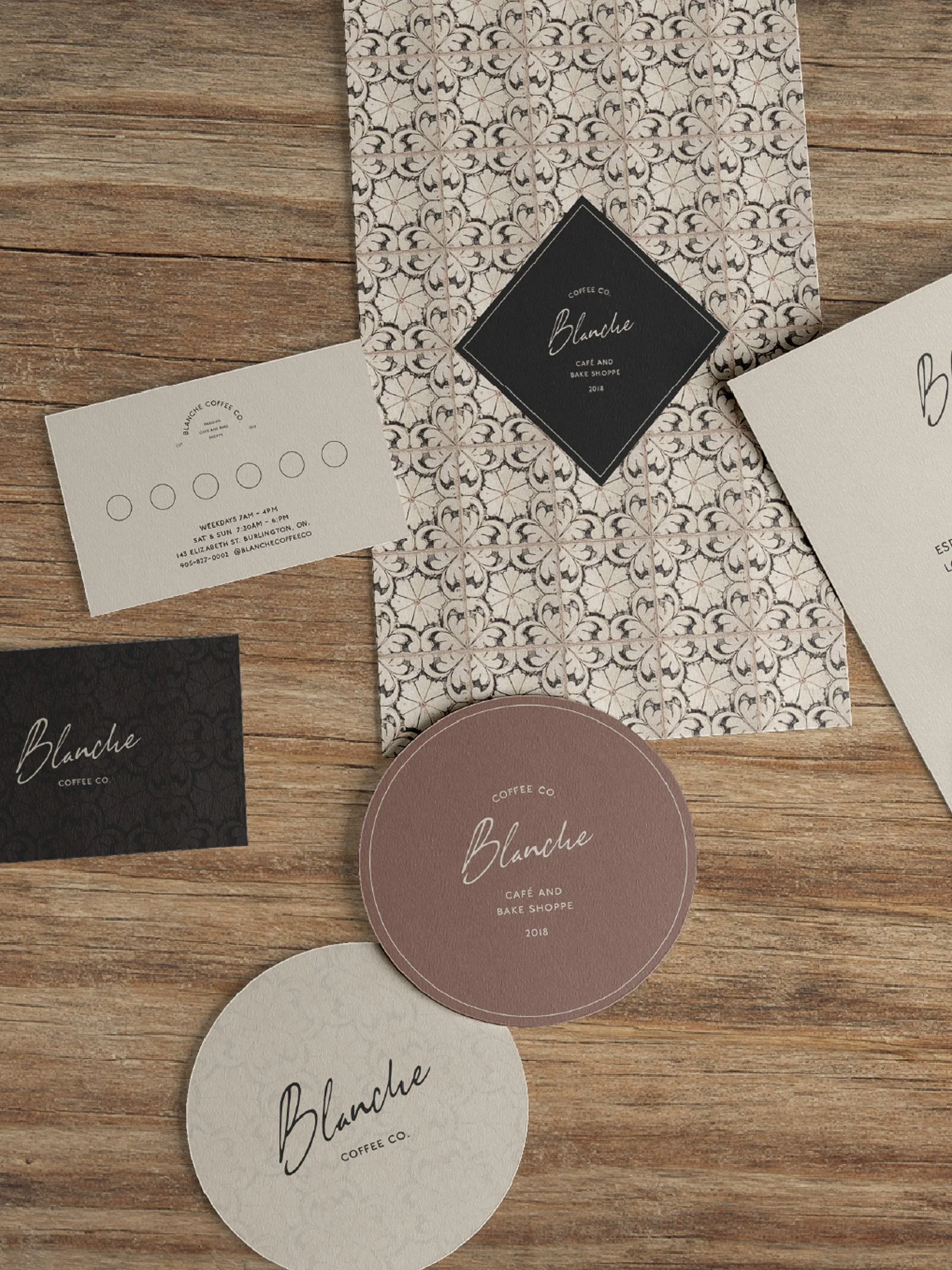 Blanche Coffee Co cafe branding including menu and print collateral punch card, coasters