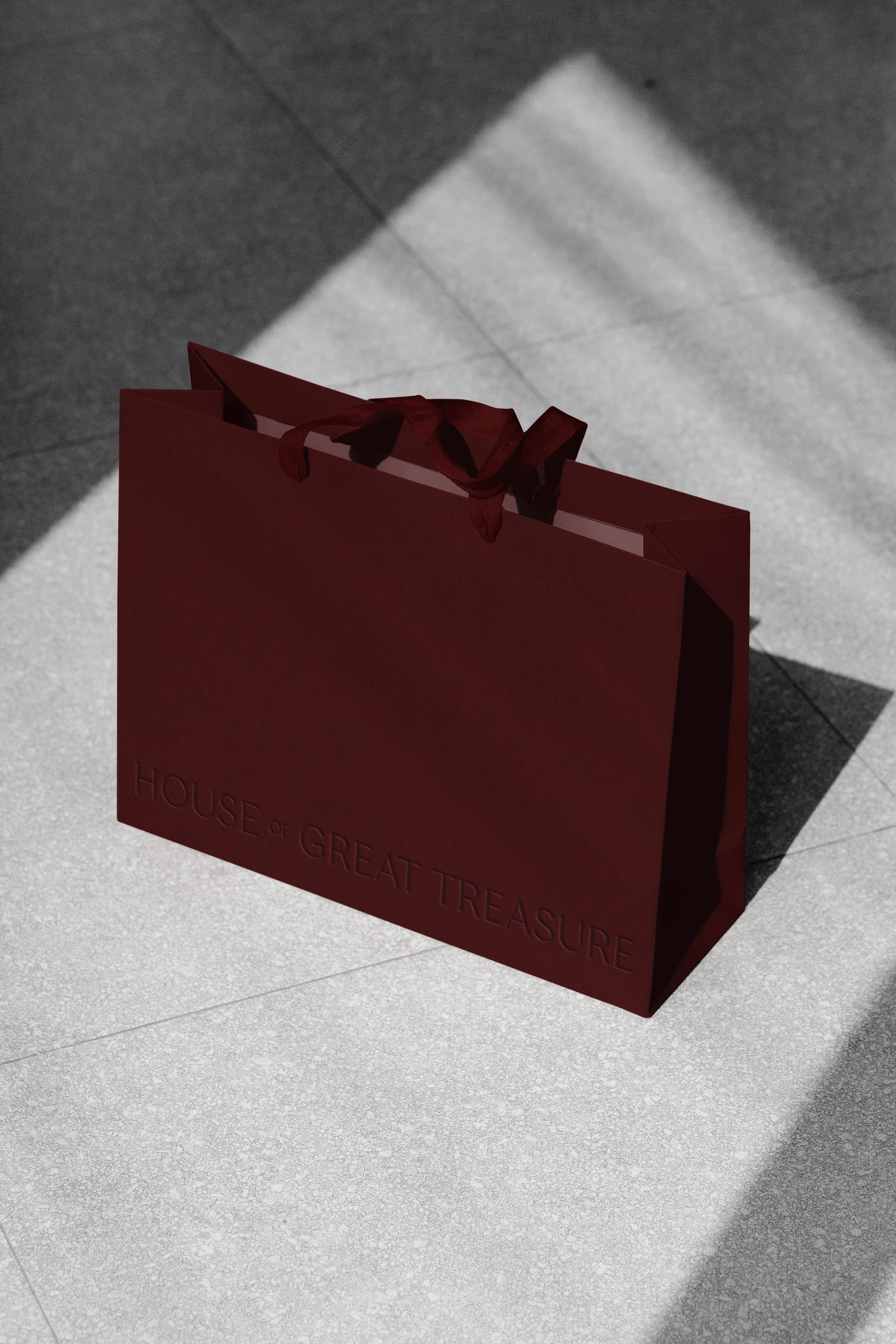 House of Great Treasure logo applied on shopping bag for luxury kitchen showroom store