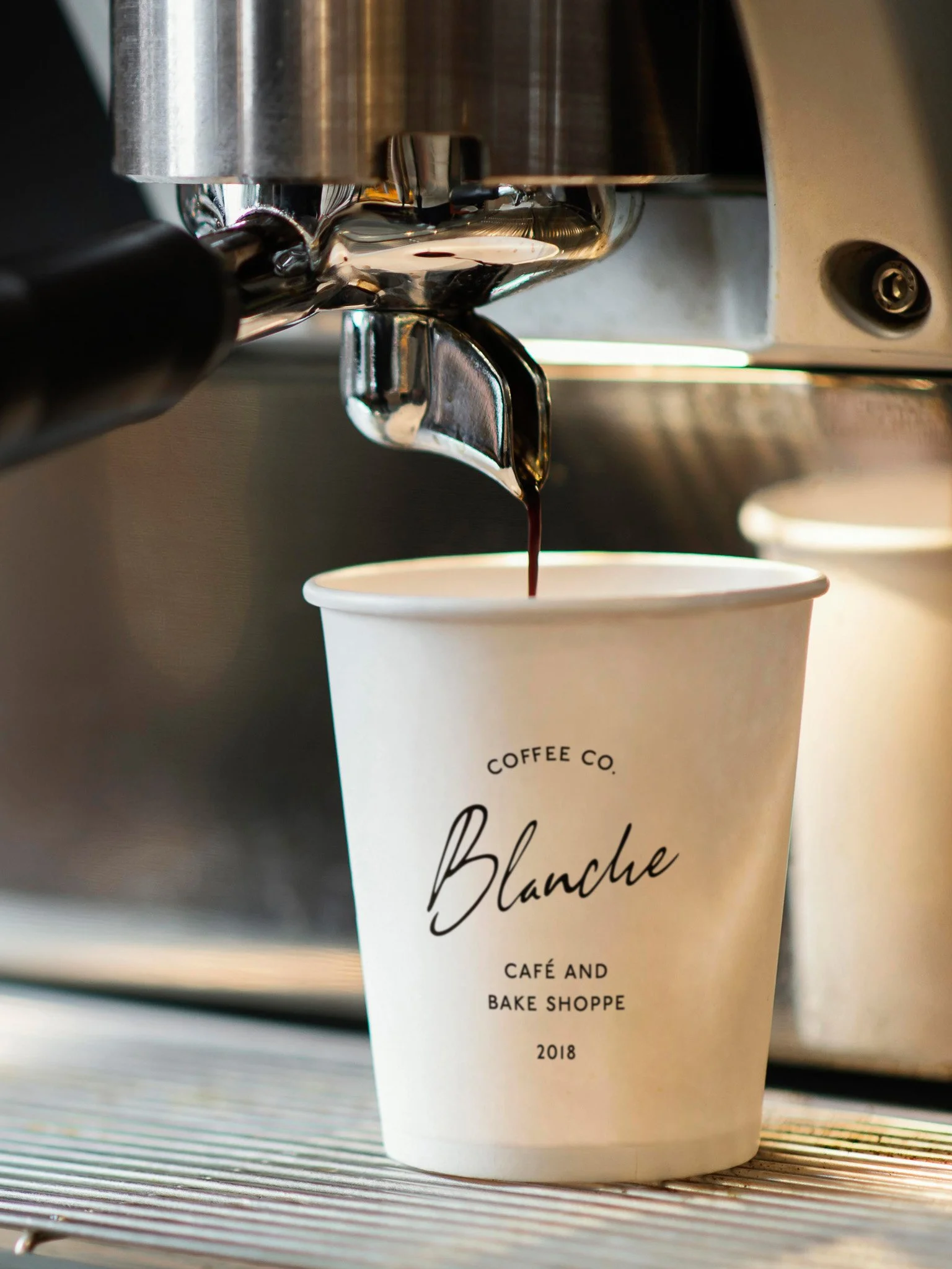 Blanche Coffee Co branded takeaway coffee cup packaging design