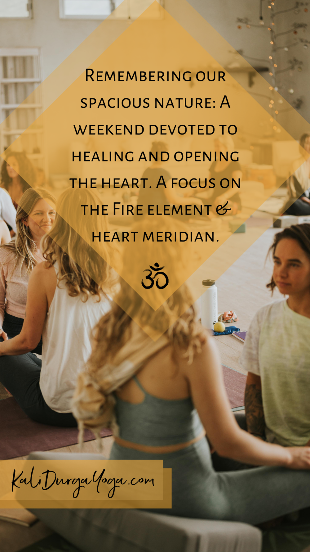 A group of people practicing yoga in a serene, well-lit indoor space with bookshelves and fairy lights in the background. The focus is on a woman with long blonde hair in the foreground, sitting cross-legged.
