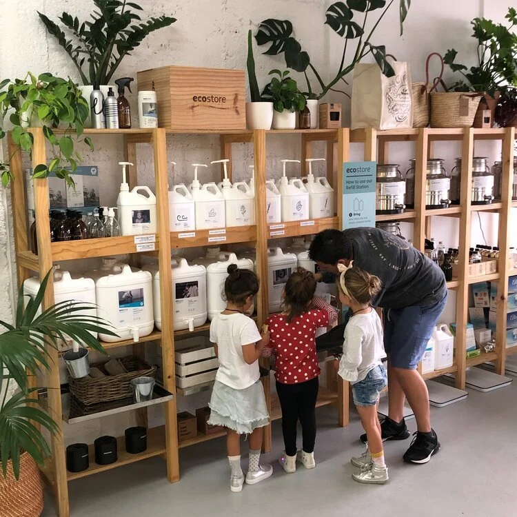 Down+To+Earth+NP- refilling jars.jpeg