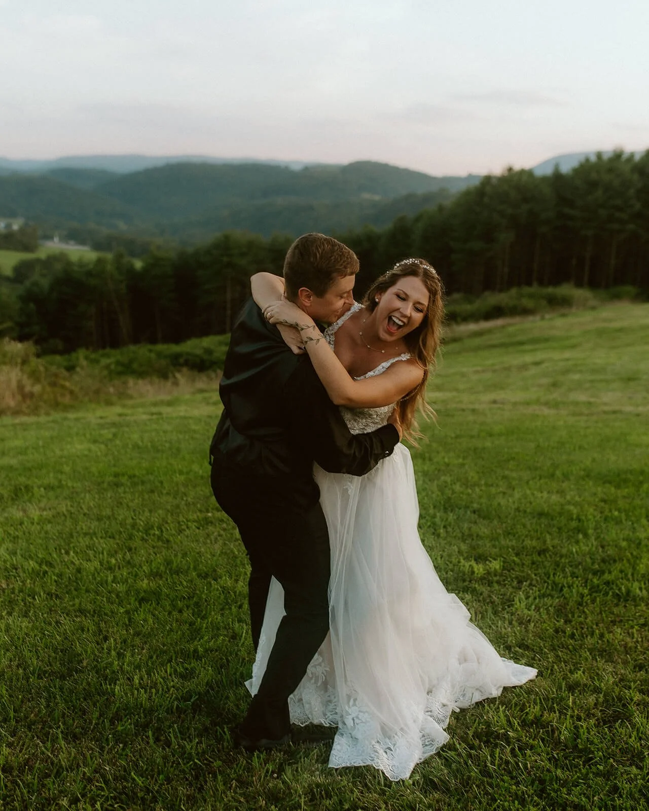 bride and groom in blue ridge mountains