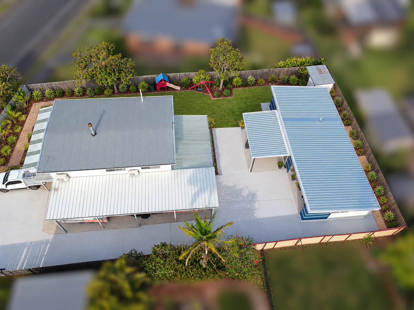 Granny flat landscaping concept — digitally edited landscaping; neighbouring properties blurred.