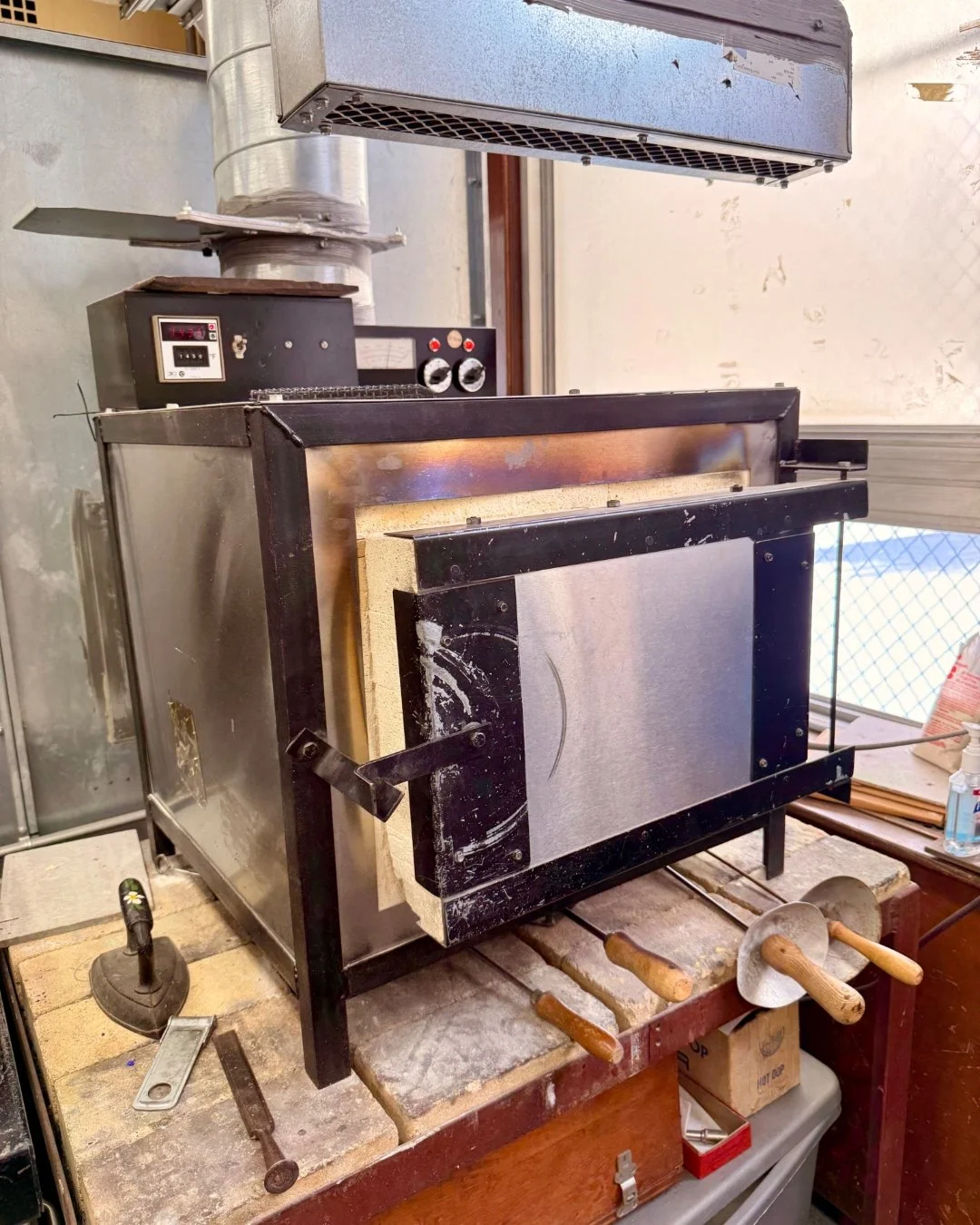 🔥 Behind the scenes at Ore 🔥
Did you know we have two kilns dedicated to enameling in our metal studio?
These kilns allow students to fire vitreous enamel onto copper and silver &mdash; fusing powdered glass to metal at high temperatures to create 