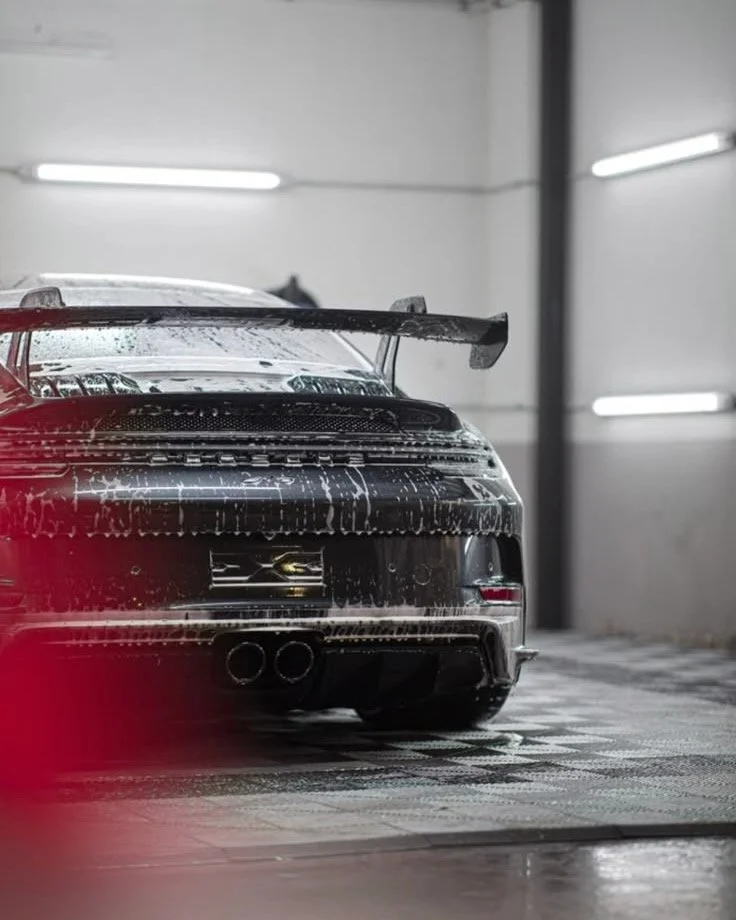 A porsche 911 bering detailed in Orange County, CA.