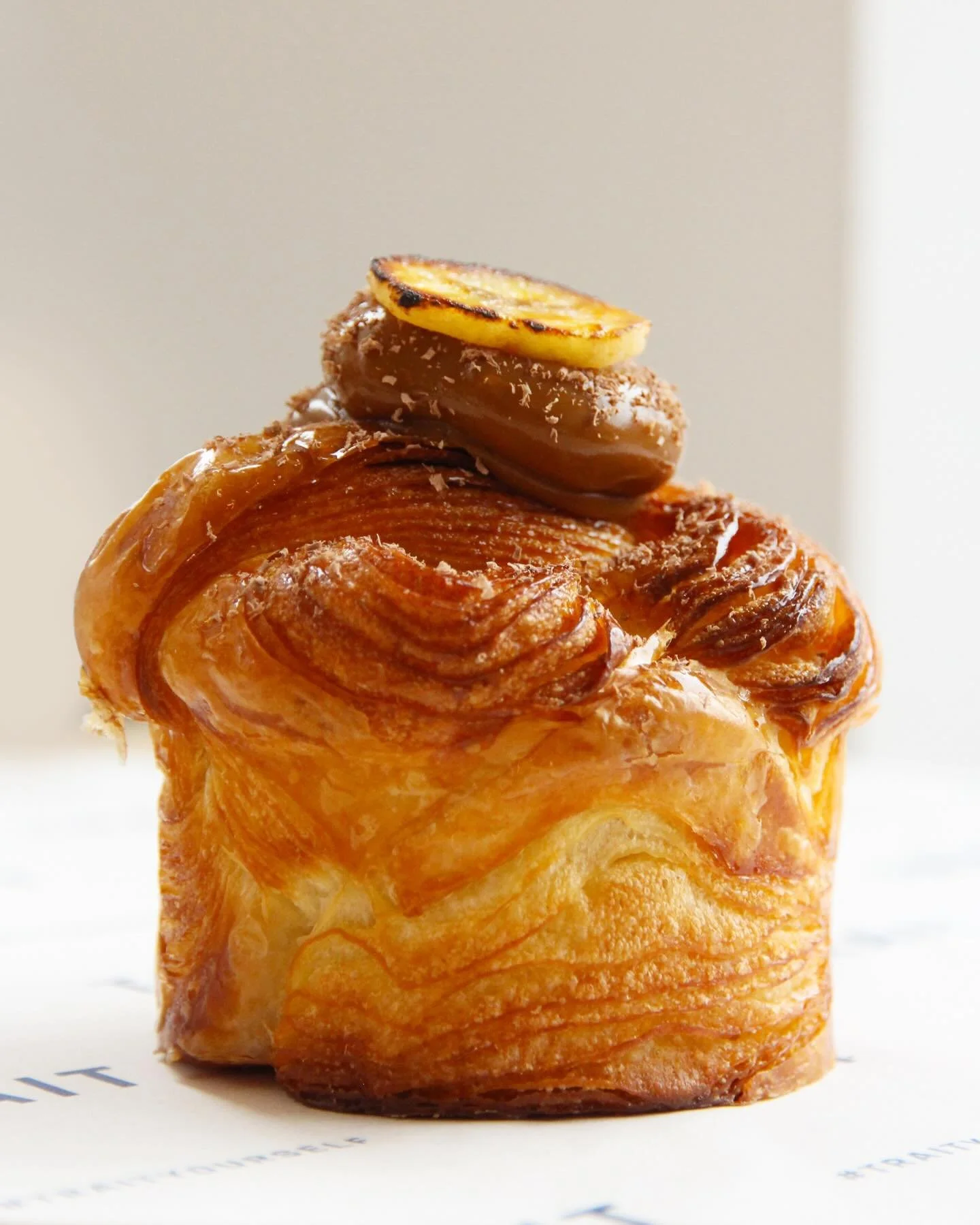 Your Friday just got even sweeter! 

Our banoffee knot is now available across all locations 🍌

Braided croissant pastry filled with a sweet banana cr&egrave;me aux &amp; dulce de leche, toppped with a dark chocolate dusting &amp; finished off with 
