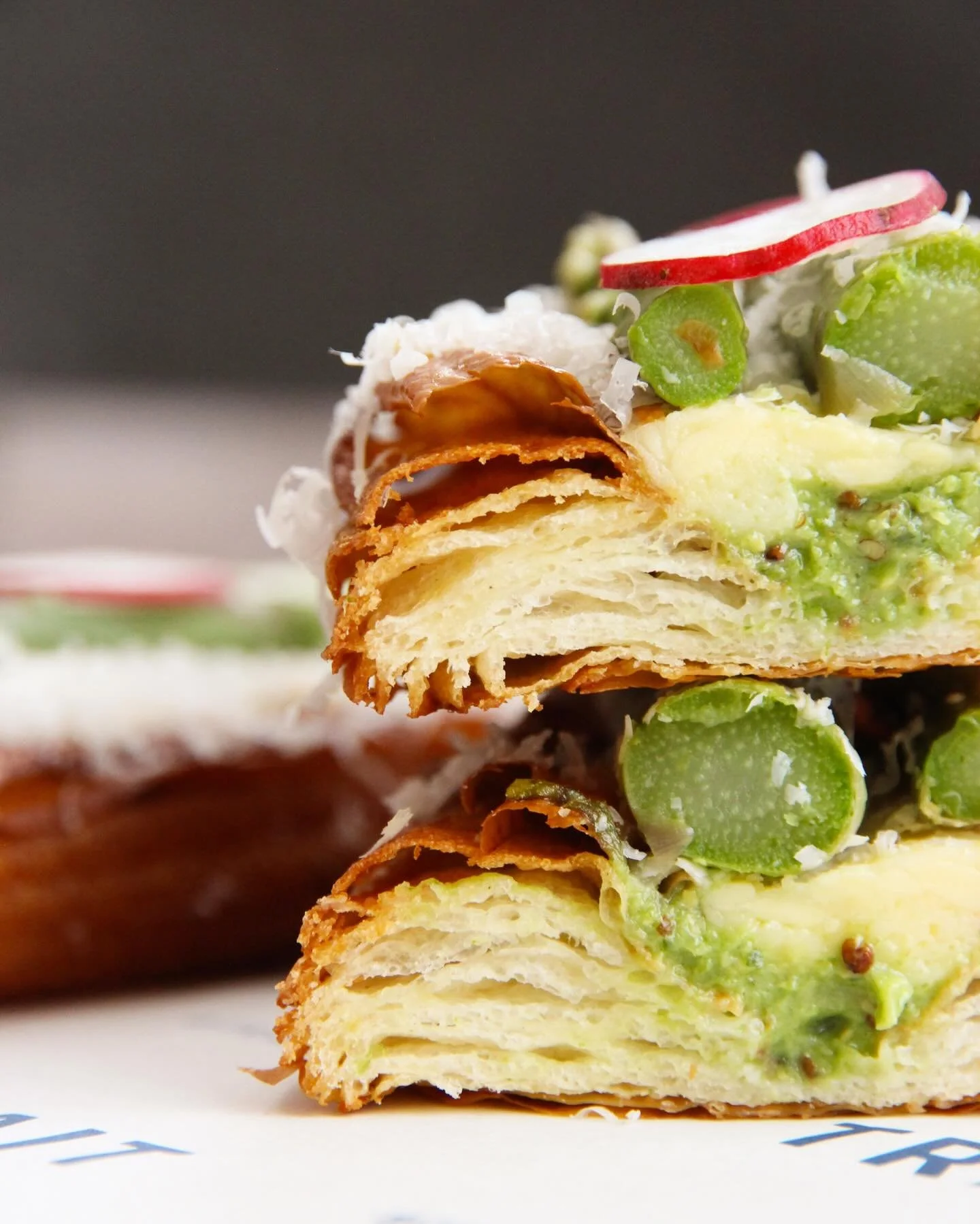 We have the perfect spring-time savoury for you 🌸🌱

✨ ASPARAGUS DANISH ✨

Our flaky croissant dough has been layered with house-made spring onion pesto, cheddar &amp; parmesan, topped with a asparagus spear &amp; finished with fresh radish 

#artis