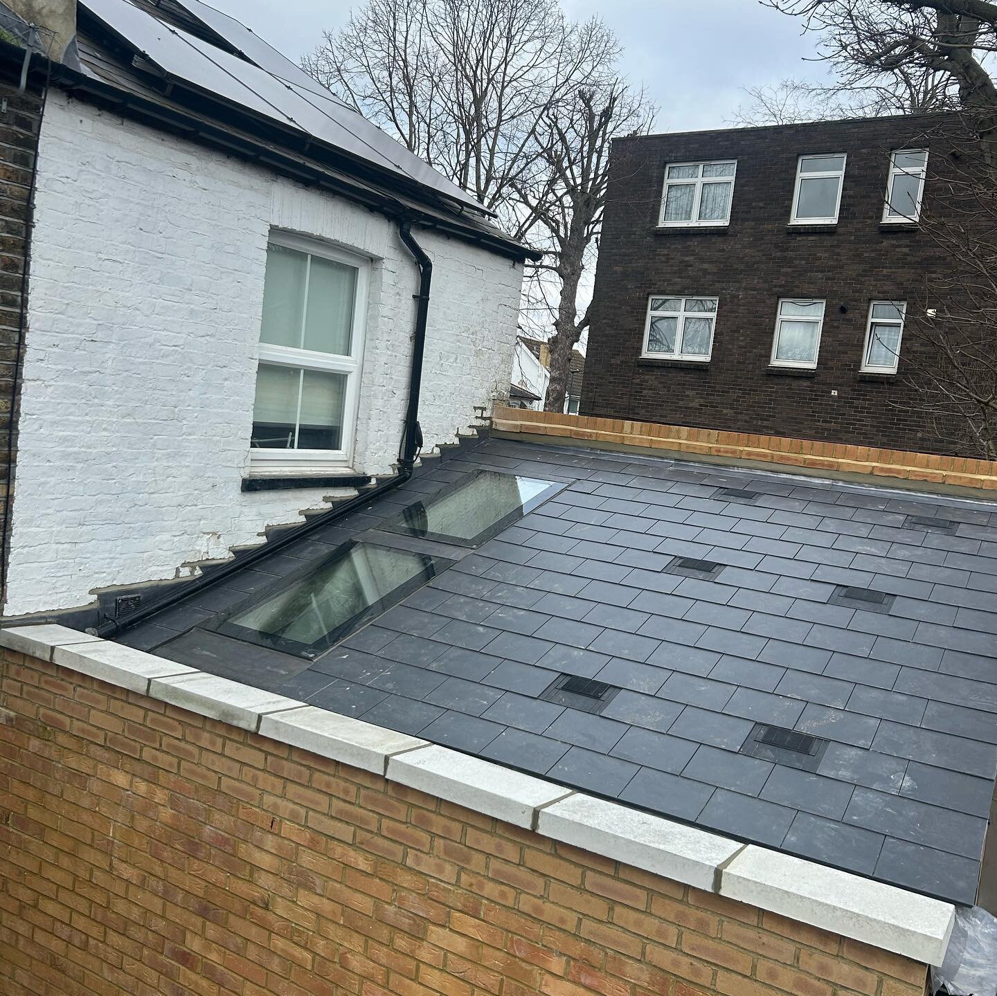 A new extension roof we have just completed in Shooter&rsquo;s Hill SE18 with new Marley eternit slates new code 5 lead box&rsquo;s gutter and all new code 4 lead flashings to parapet walls with new coping stones to parapet wall visit www.sapsford.co