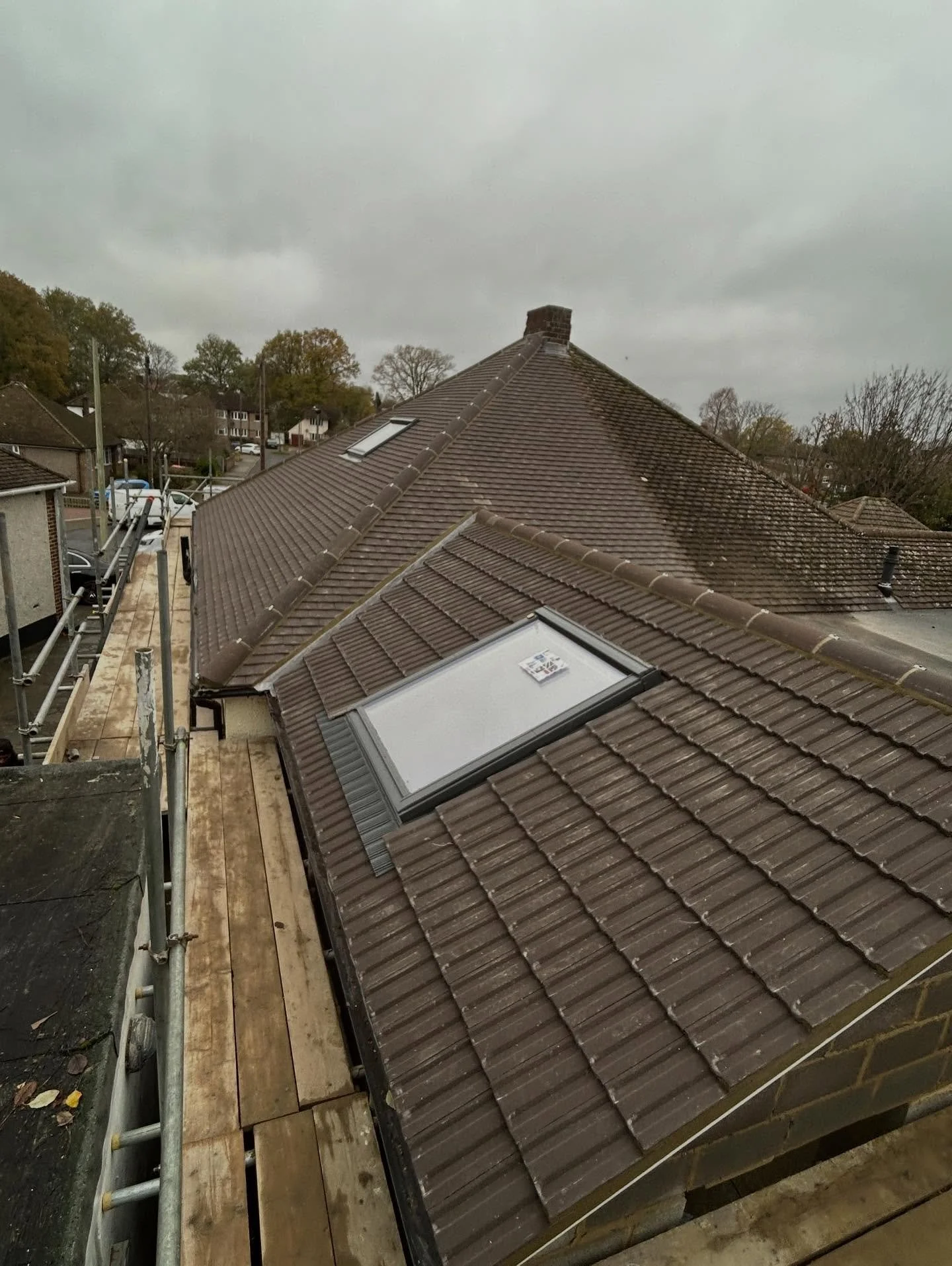 The last plain tiler of the year we completed today in Petts Wood - we used Sandtoft Concrete plain tiles in Granular Brown on the main roof of Bungalow and on the new extension roof we used Sandtoft Conrete Granular Brown interlocking tiles due to t