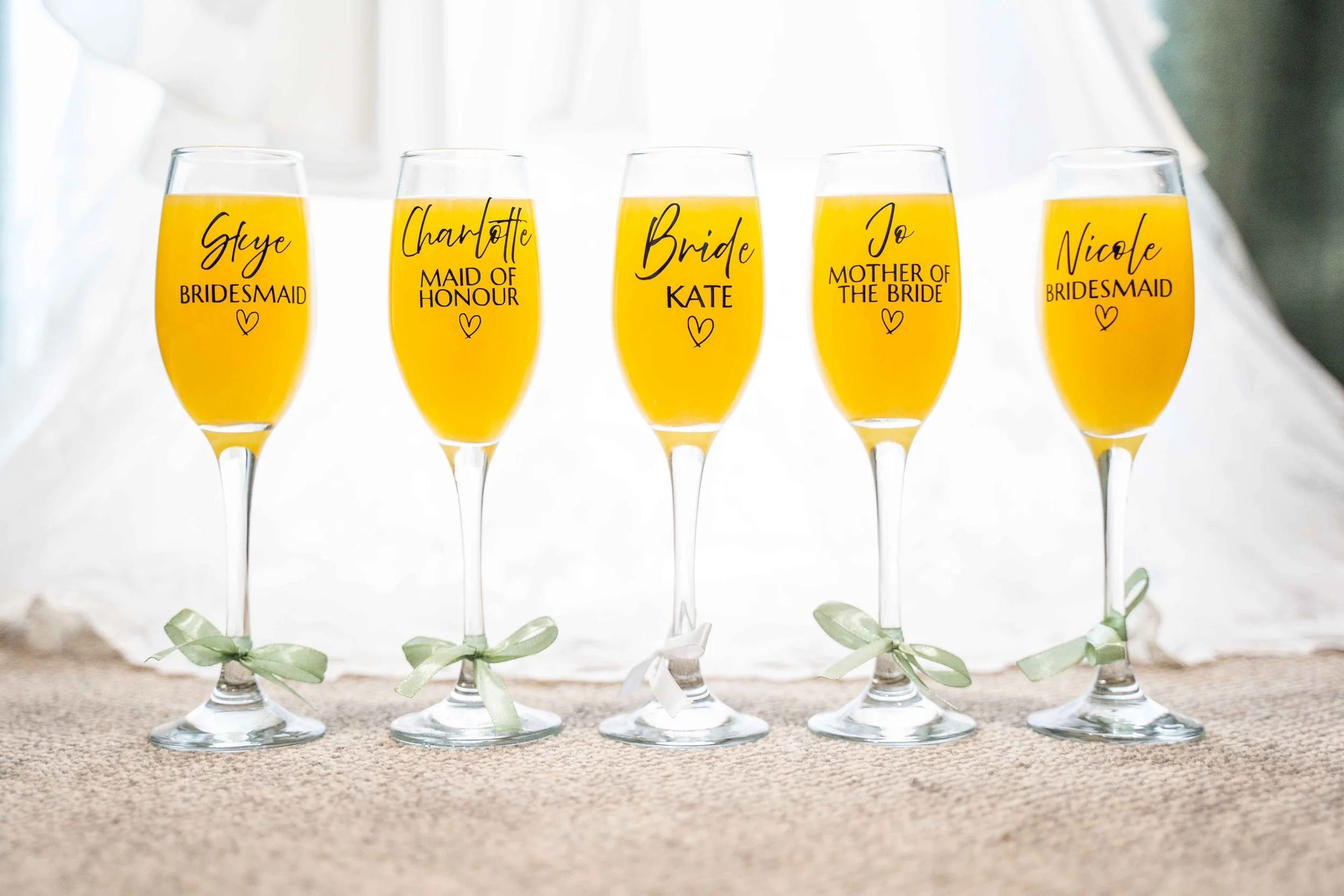 detail shot of named champagne flutes at a wedding.jpg