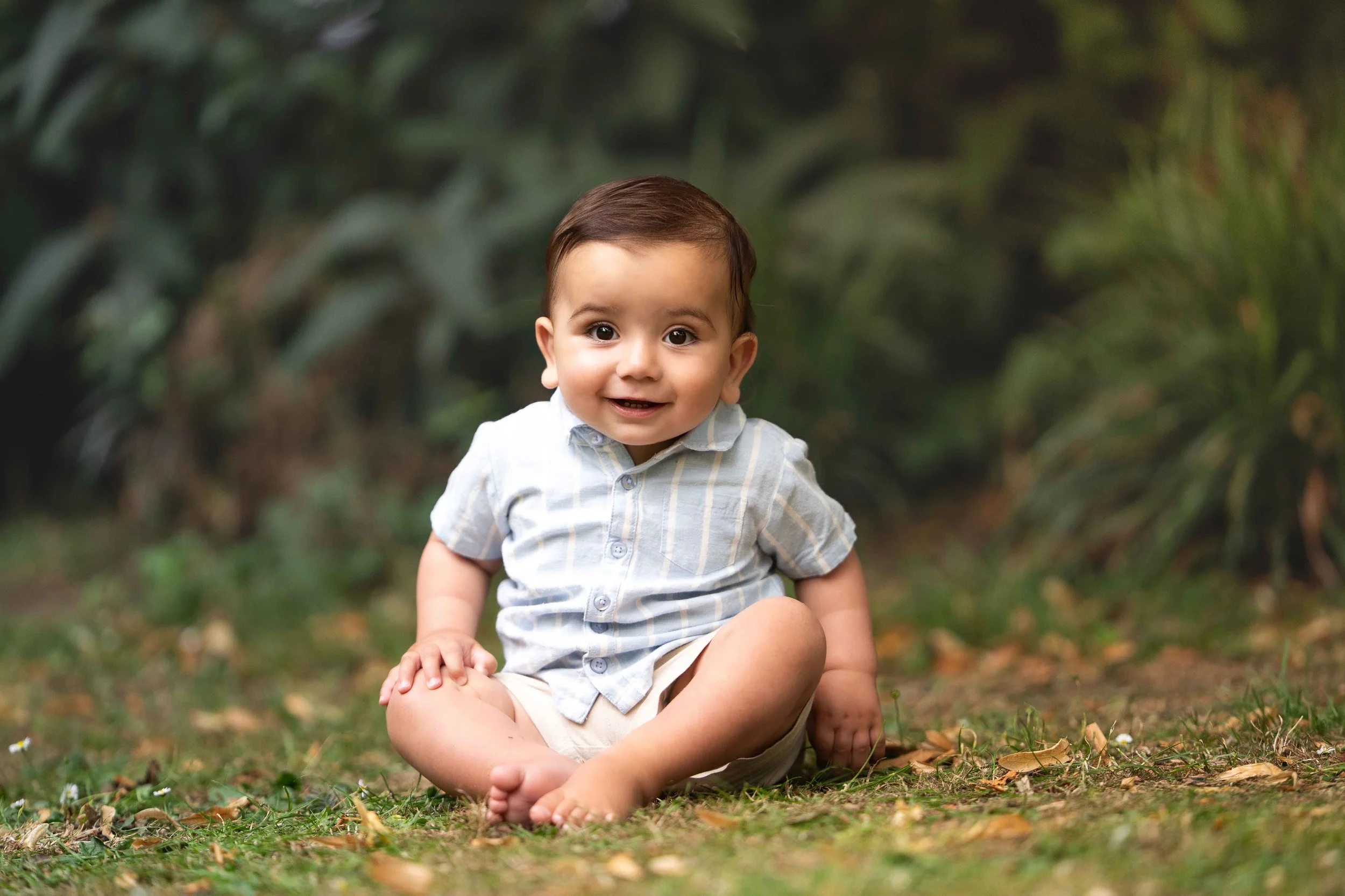 smiling one year old boy 