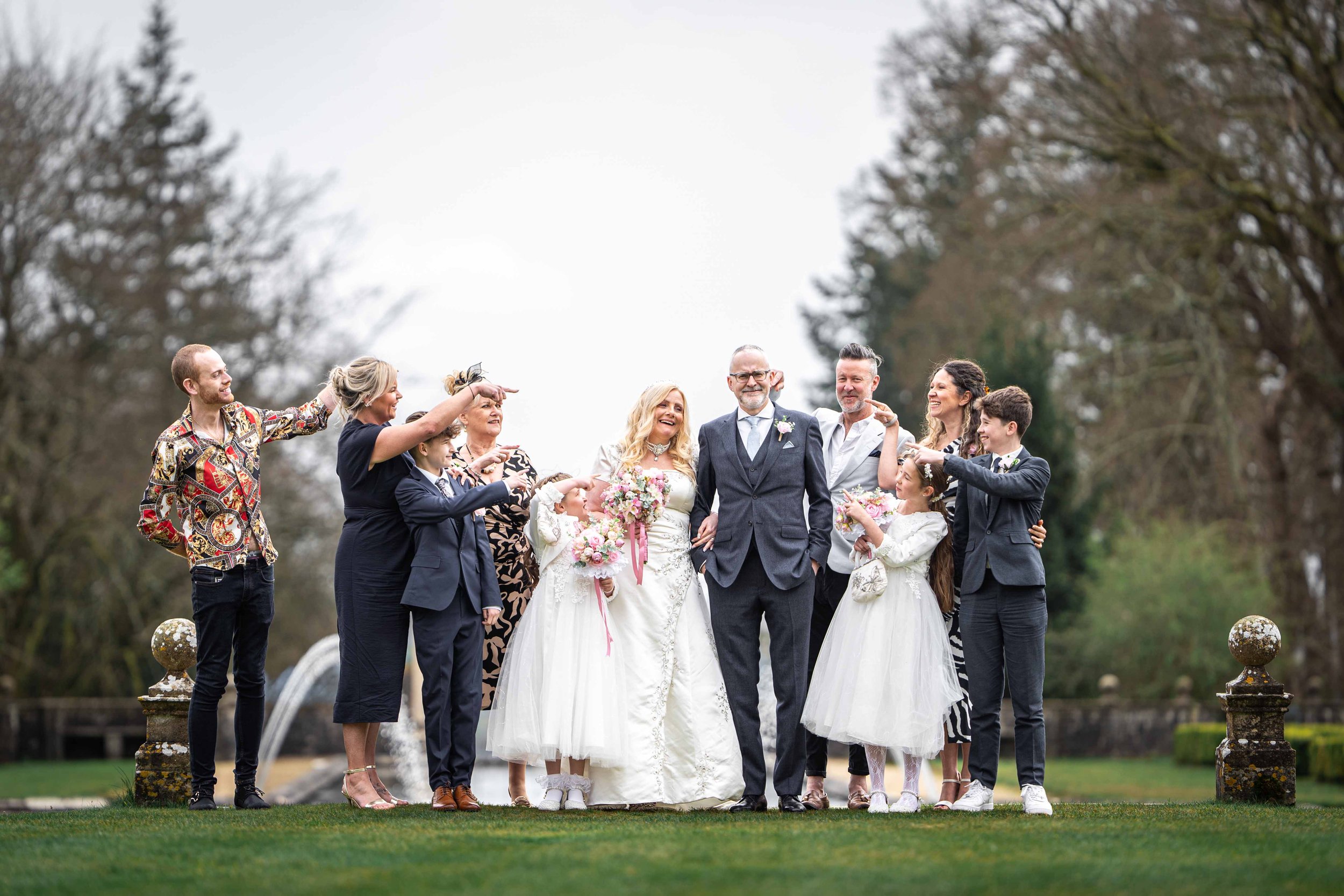 Wedding party at Rhinefield Hotel in the newforest making sure we know who the bride and groom are