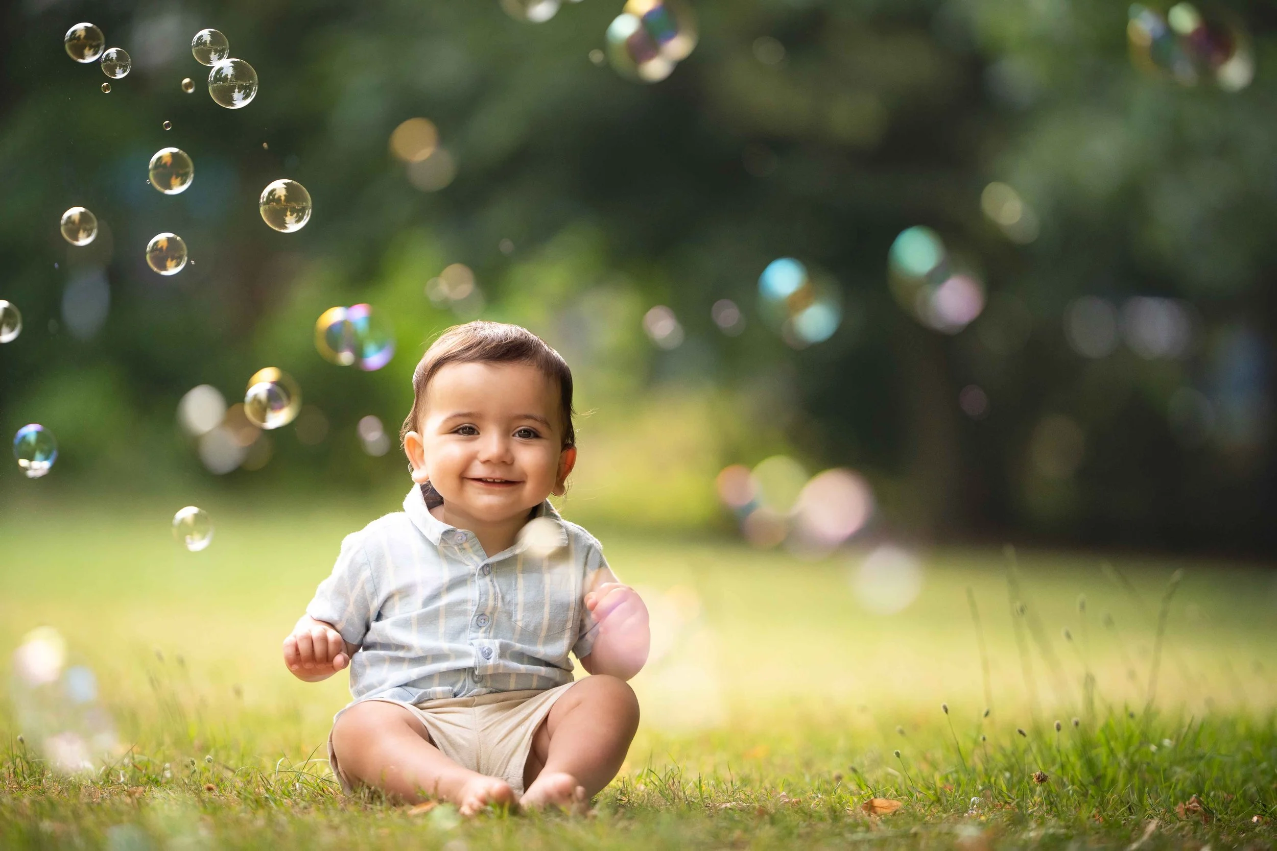 1st birthday photoshoot in Southampton park with lots of bubbles