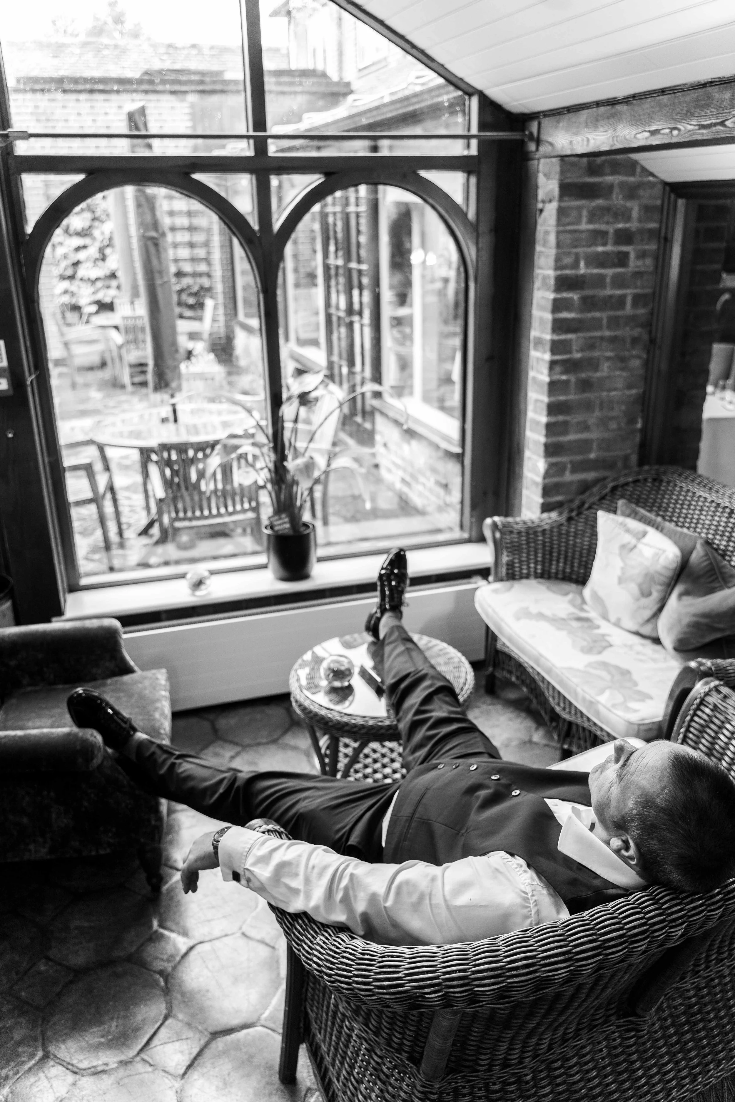 groom resting in a hotel's lounge