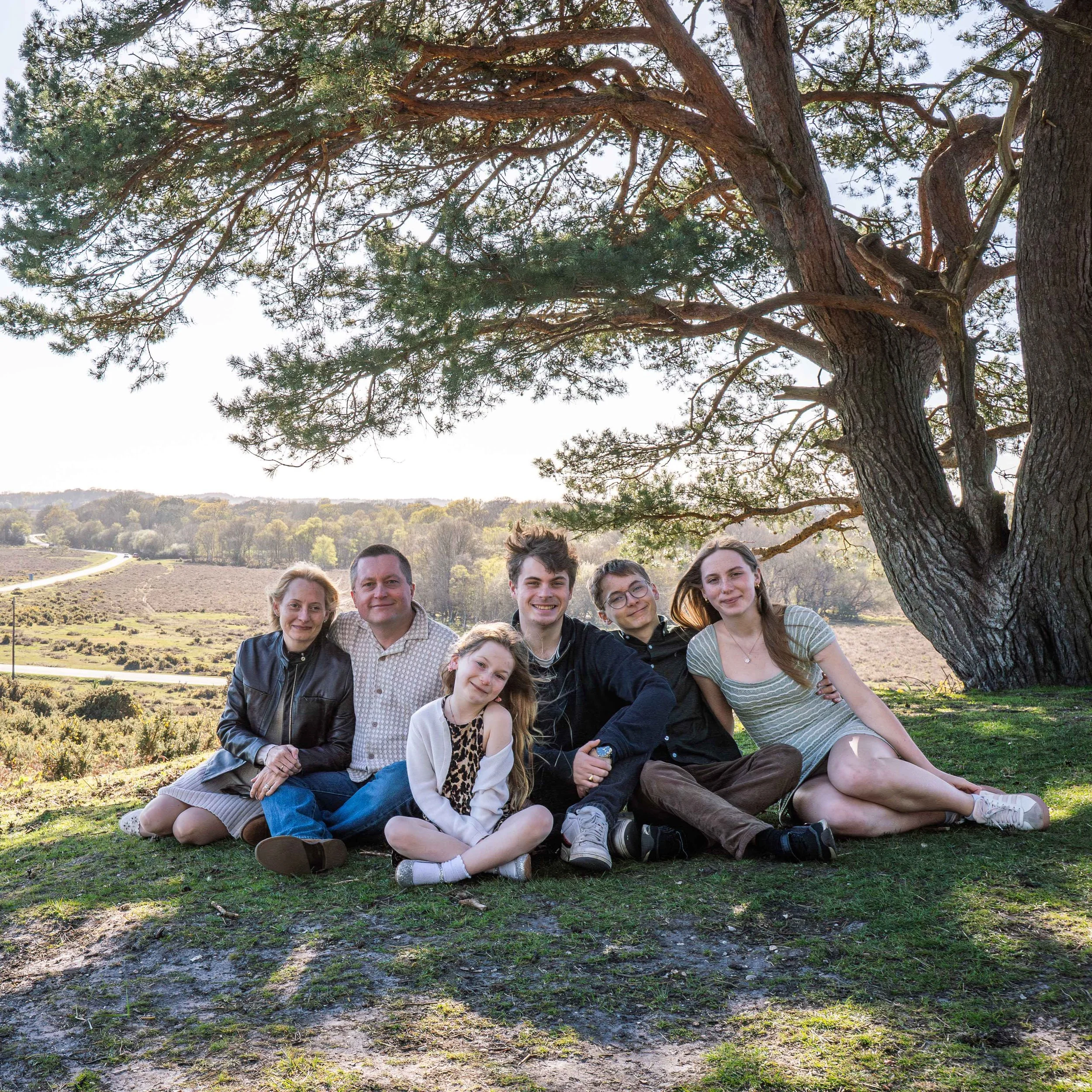 whole family portrait in the forest