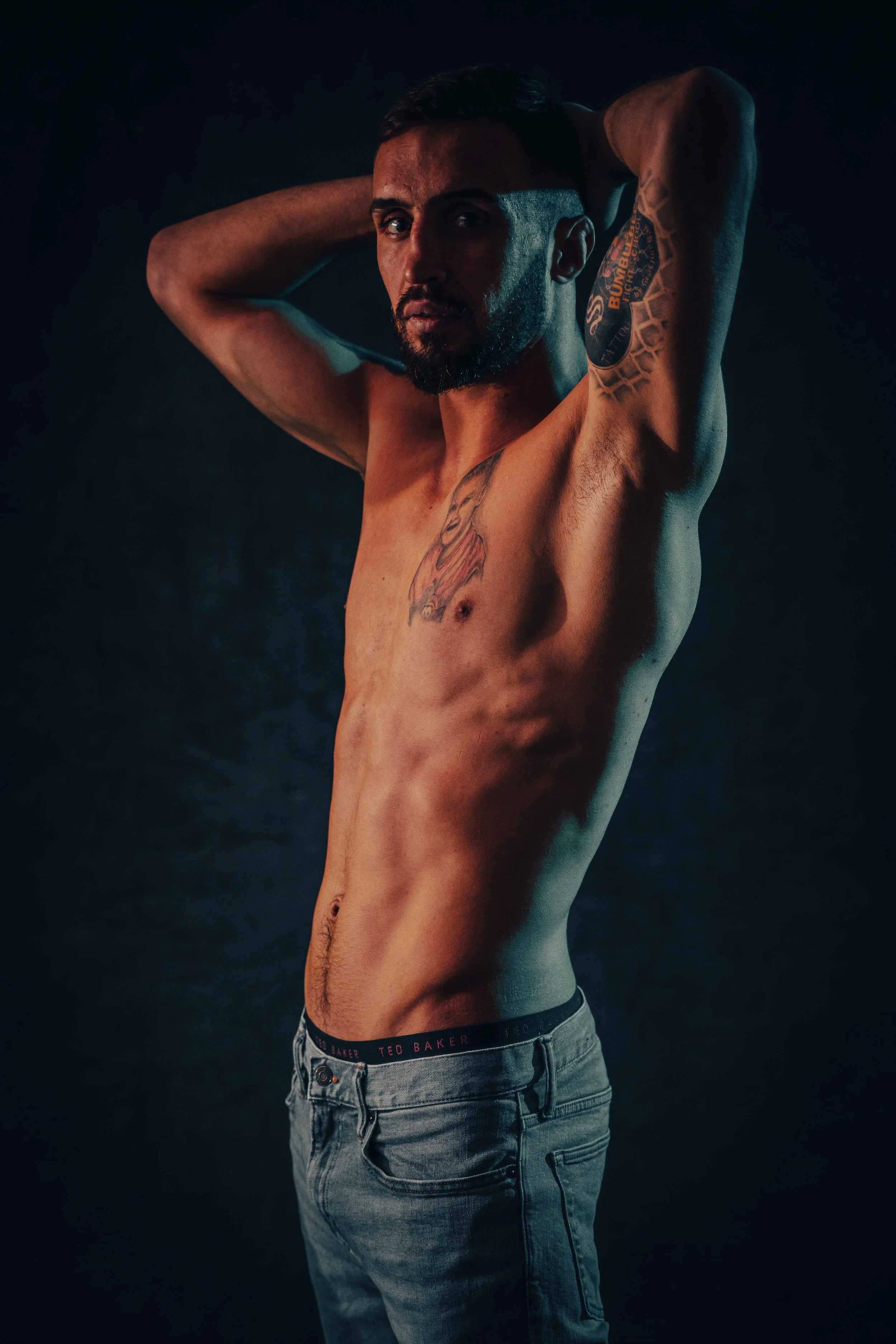 lean muscular boxer in a studio portrait session