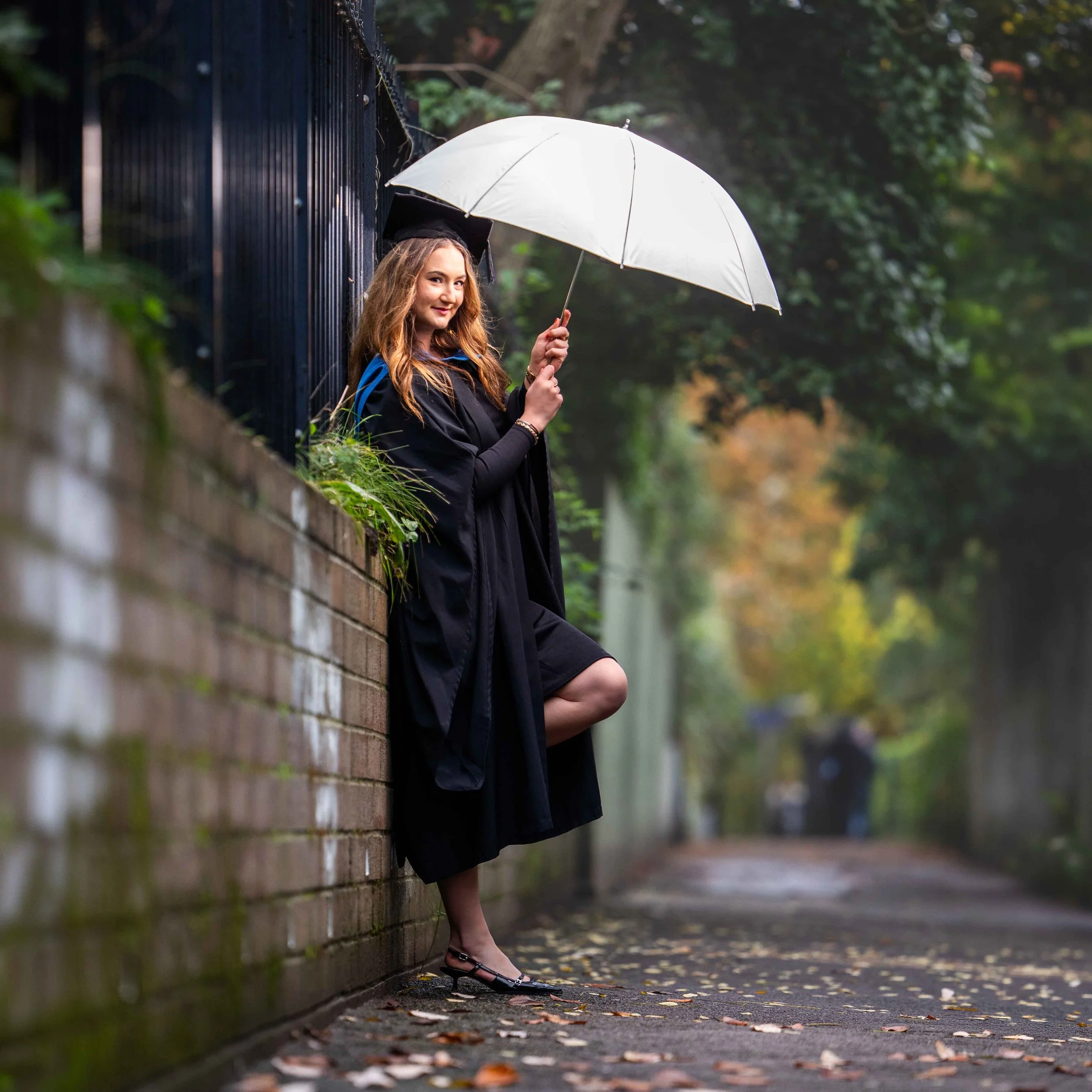 portrait of a graduate in the park