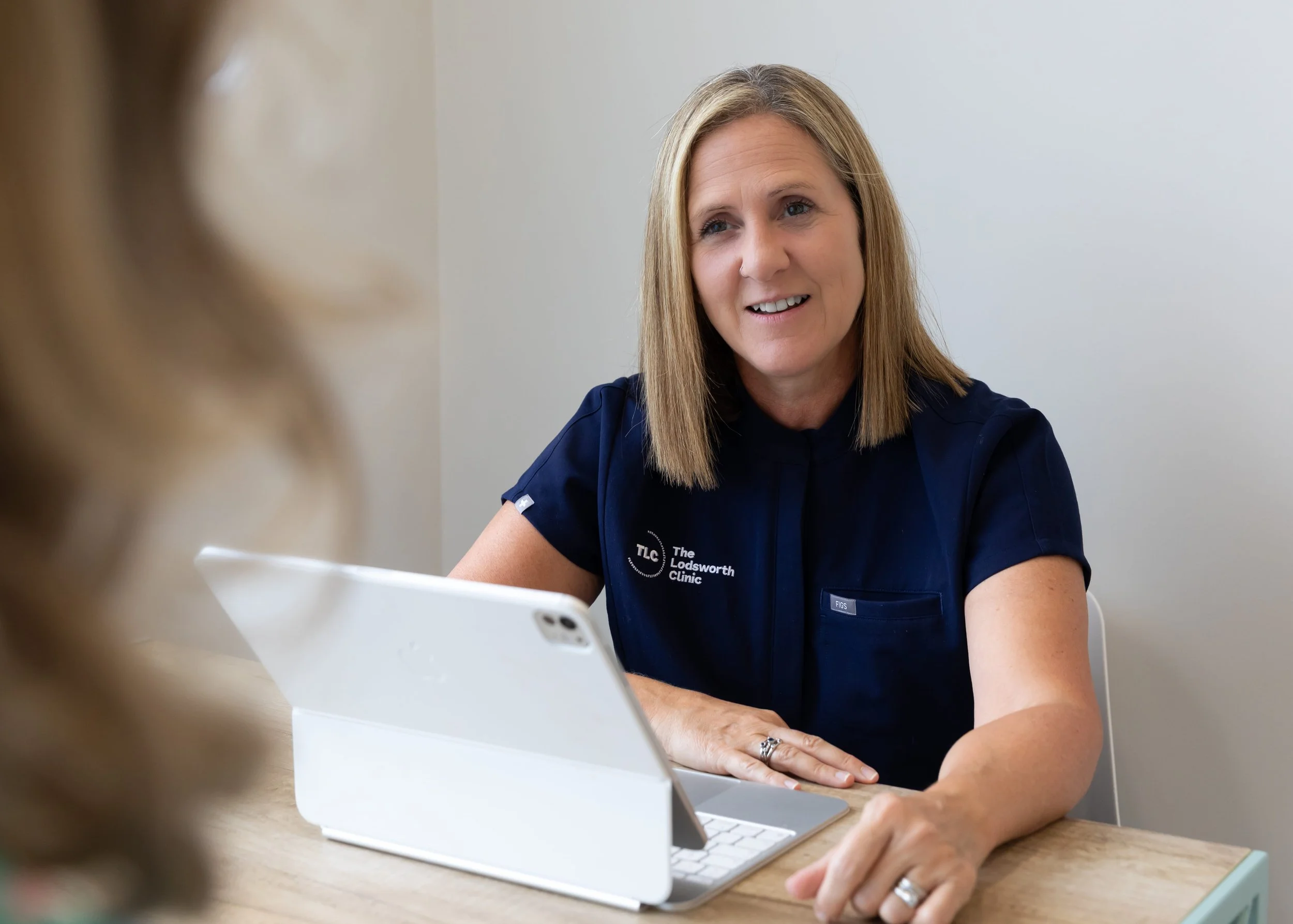How does a private GP service differ from the NHS?