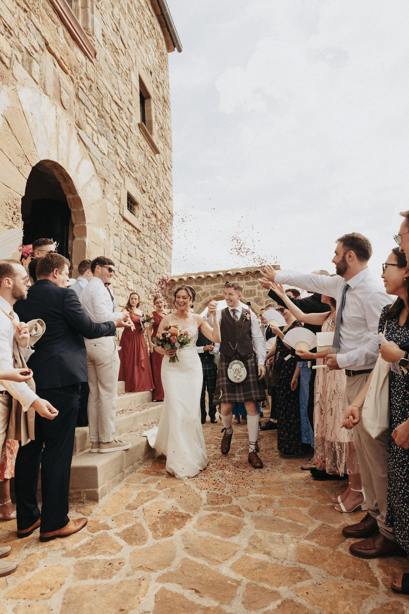 bride-and-groom-in-traditional-scottish-wedding-castell-d-enfesta-barcelona-destination-wedding-photographer.jpg