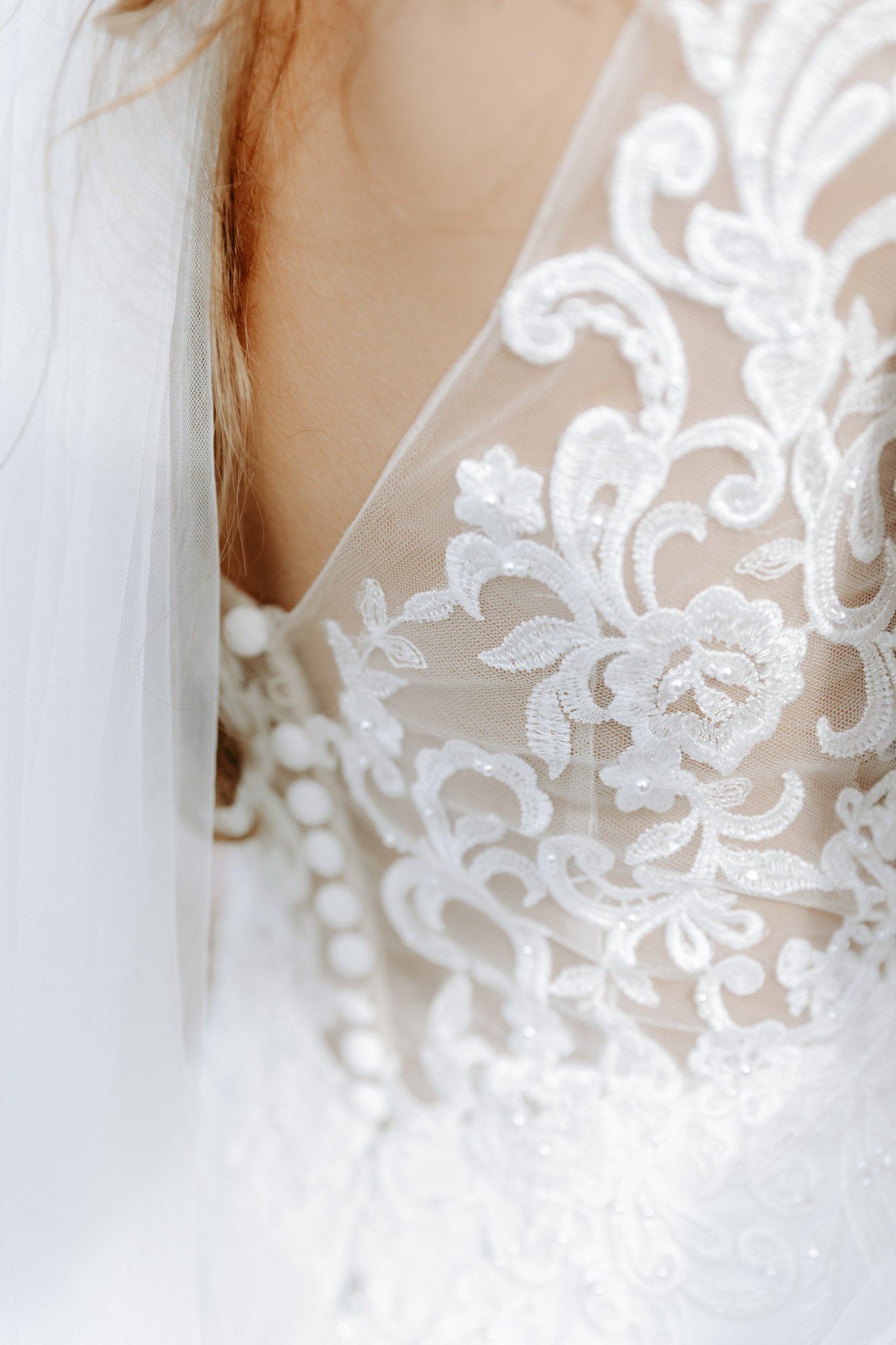 bride-dress-detail-la-donaira-marbella-destination-wedding-photographer.jpg