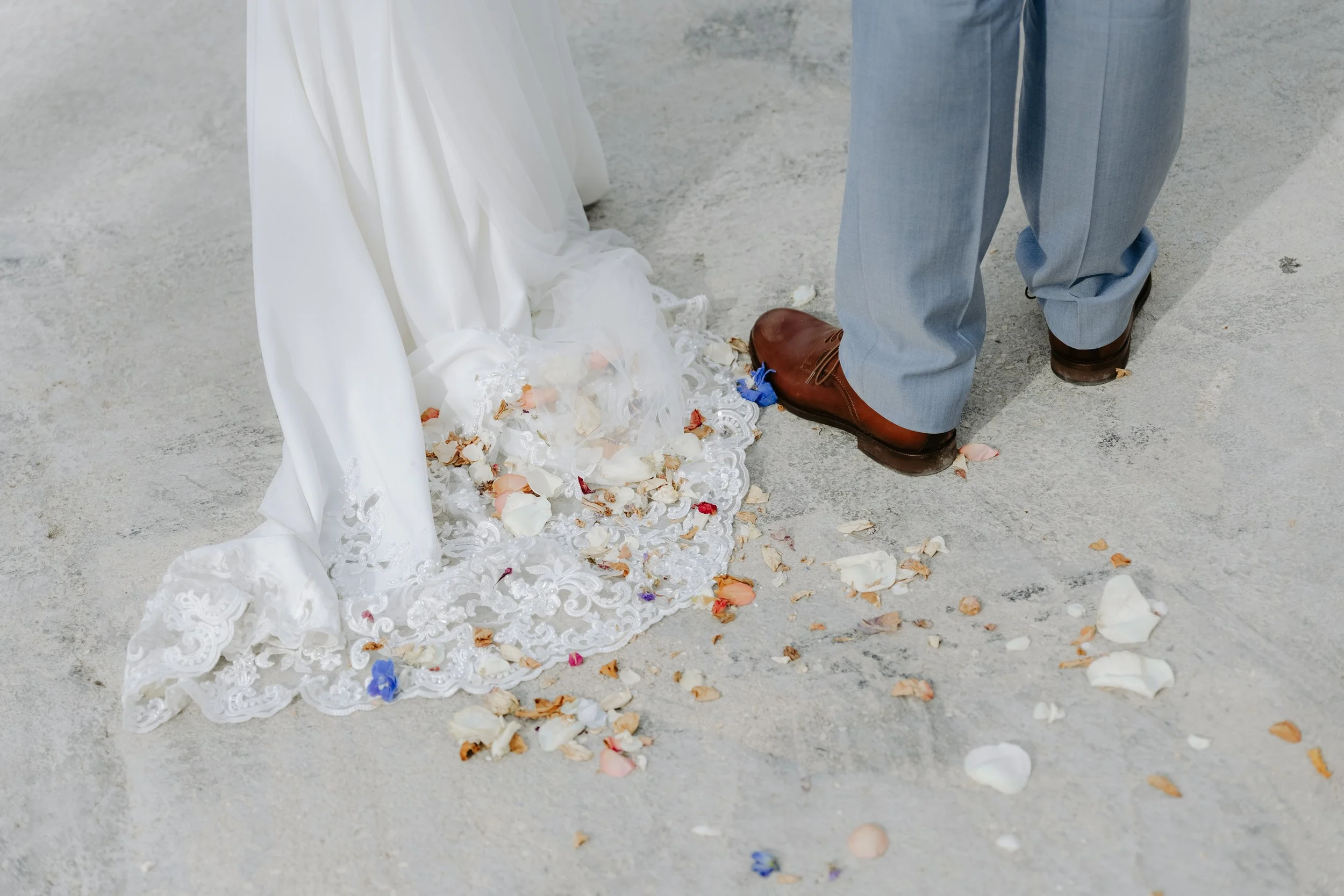 Bride's dress detail after the ceremony