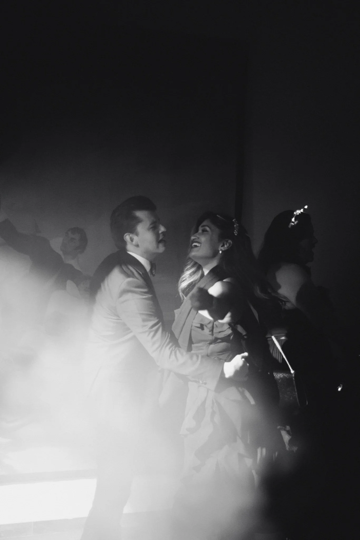 editorial-portrait-of-wedding-party-couple-dancing-in-black-and-white-film-hotel-santa-marta-girona-destination-wedding-photographer.jpg