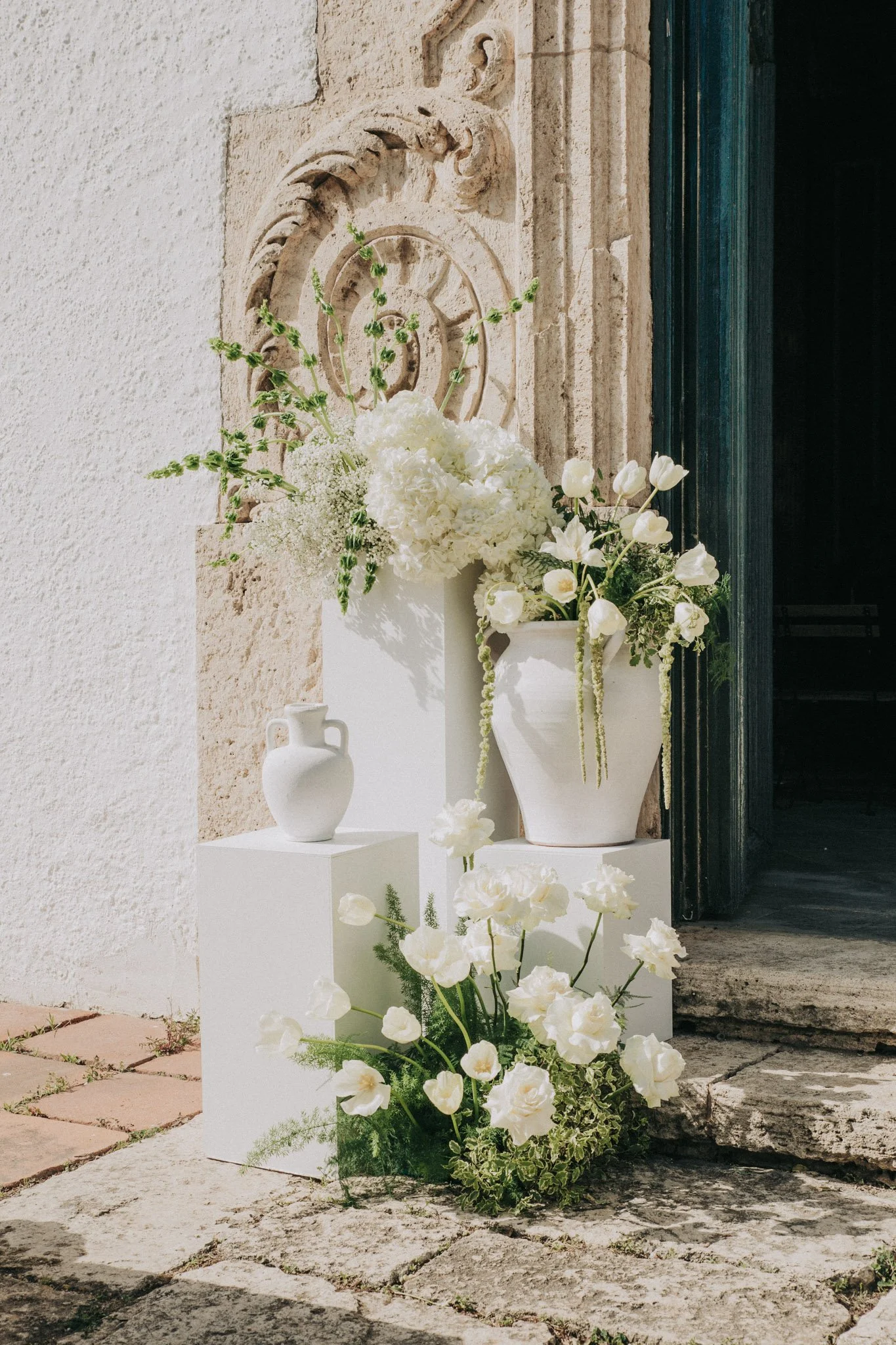 flower-religious-ceremony-decor-at-church-mas-torroella-girona-destination-wedding-photographer.jpg