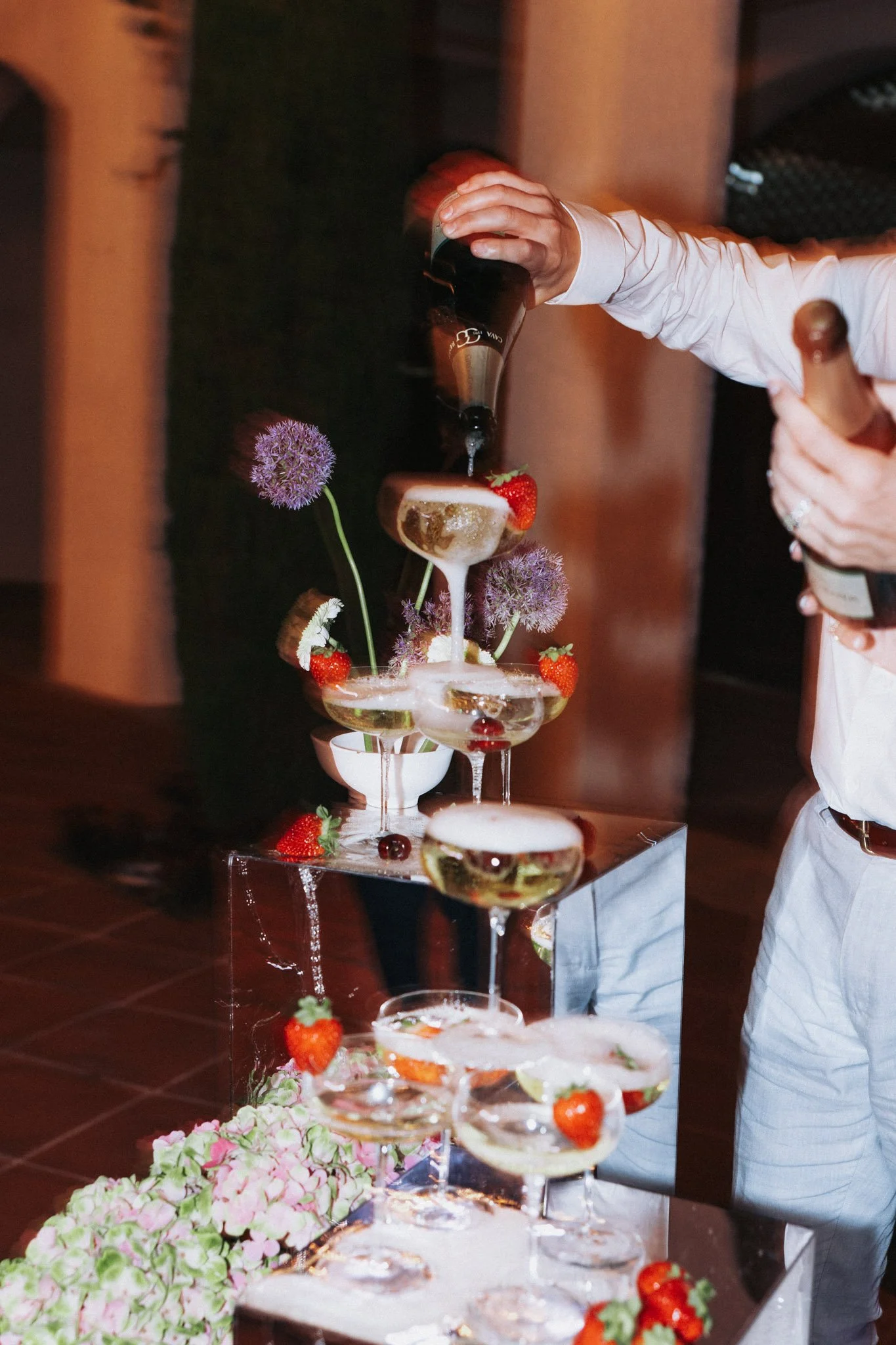 champaigne-tower-with-strawberries-and-flowers-masia-cabellut-barcelona-destination-wedding-photographer.jpg